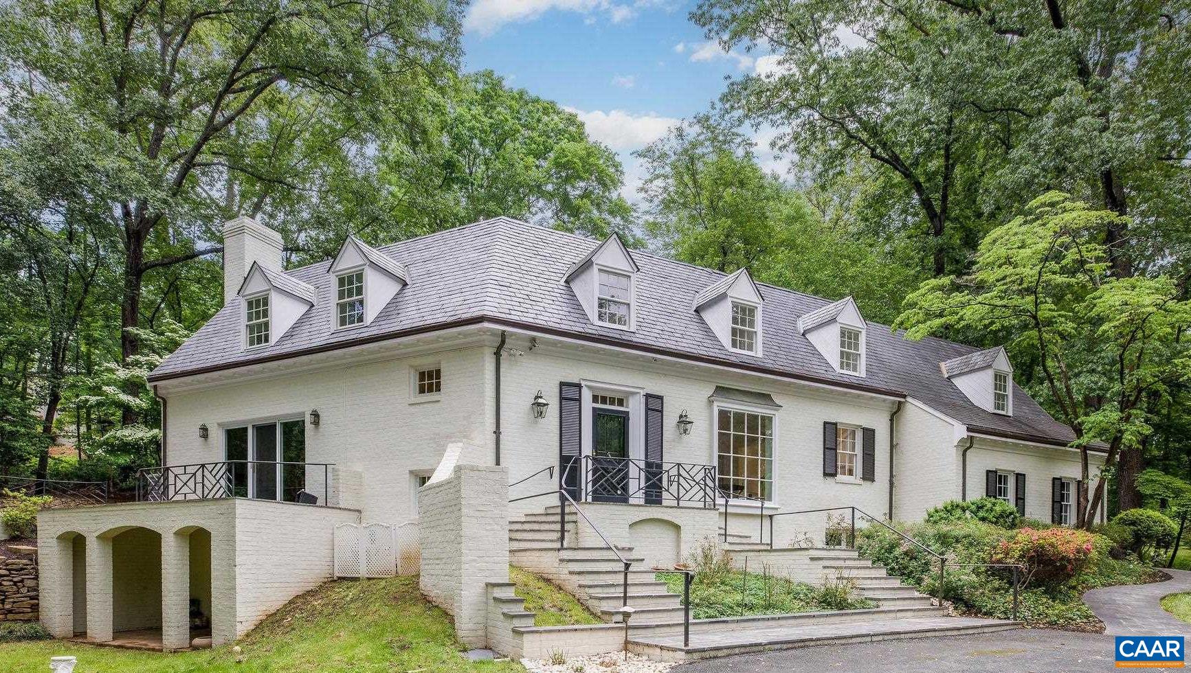 Open Saturday 2-4 and Sunday 12-2, this architecturally distinguished brick and slate Ednam Forest 4 bedroom/4 bath offers original charms paired with stunning, classic kitchen and bath renovations.  Now with beautiful hardwoods throughout, carrera marble bathrooms and kitchen, the home is 100% move-in ready.  Fireplaces in the living and family rooms, gracious slate-floored foyer, expansive bluestone rear terraces.  7 minute walk to Boar's Head Inn and Sports Club amenities.  Interior photos on May 15.  Showings commence 5/15 too.