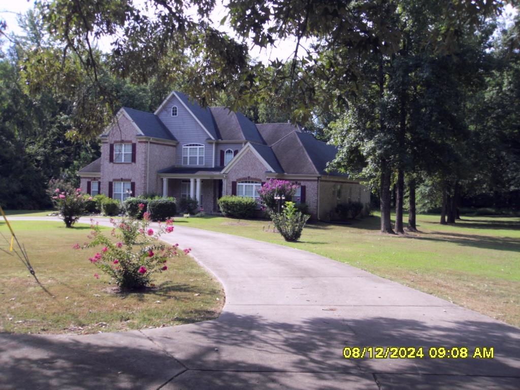 Private and secluded with professional landscaping.  Fresh mulch just last week, awaiting the arrival of Spring.