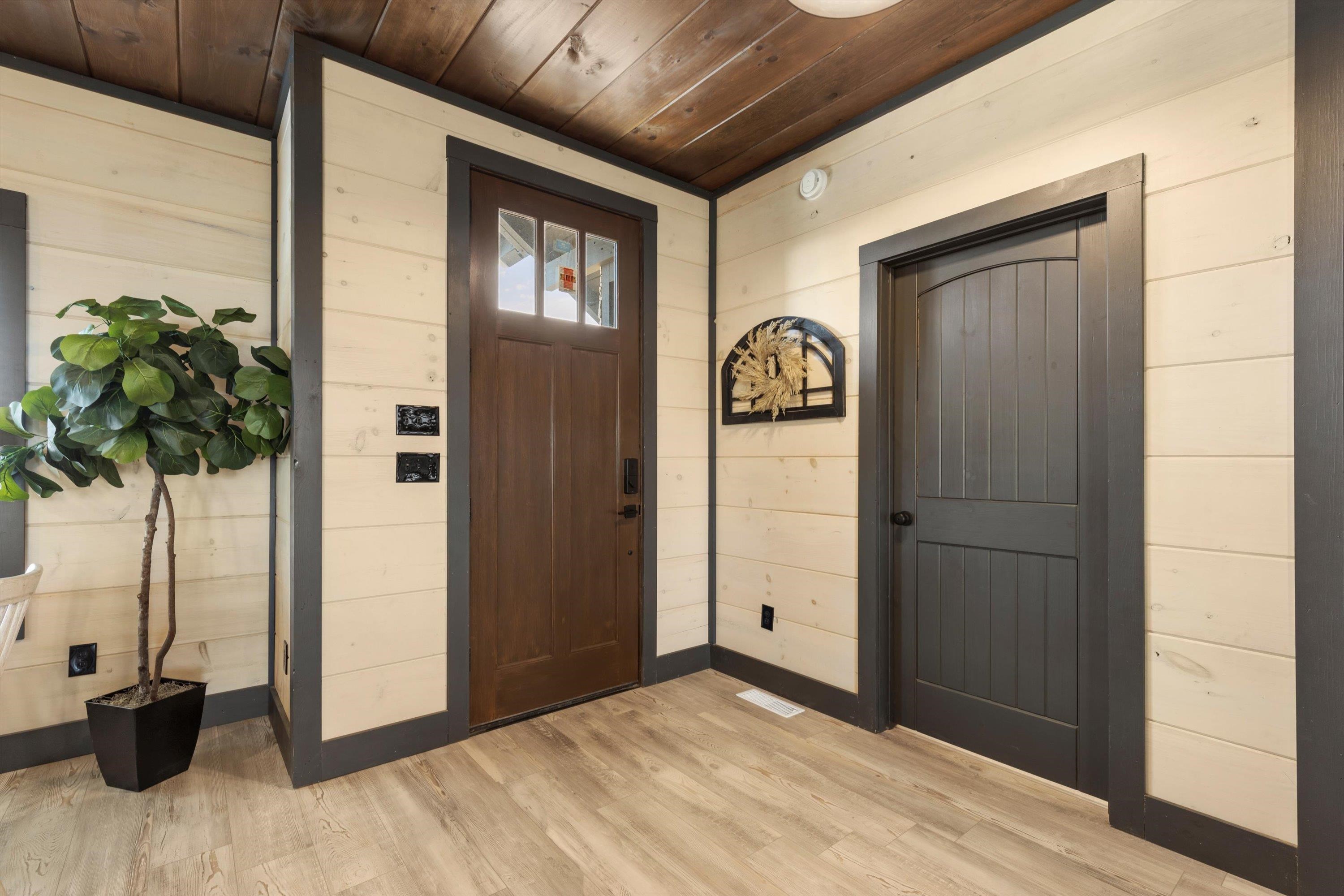 Interior of similar 5 bedroom cabin in community.  Interior finishes and furnishings vary from cabin to cabin.