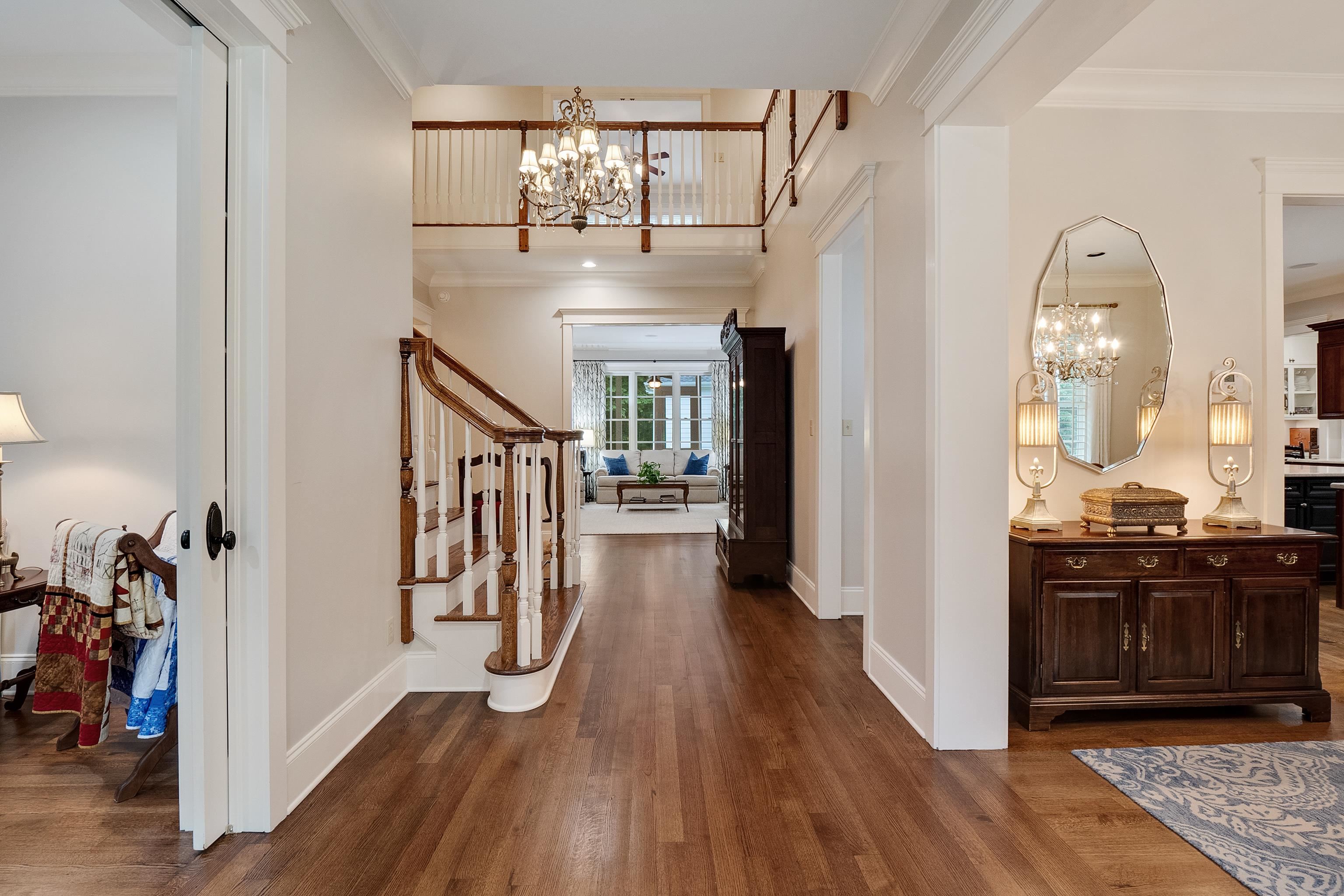 And provides a glimpse of the staircase located in the center of the house.