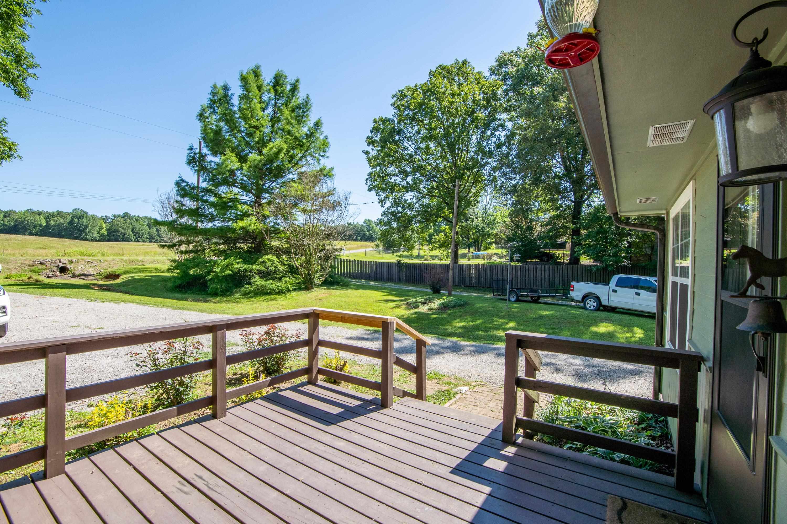 Wooden deck with a yard