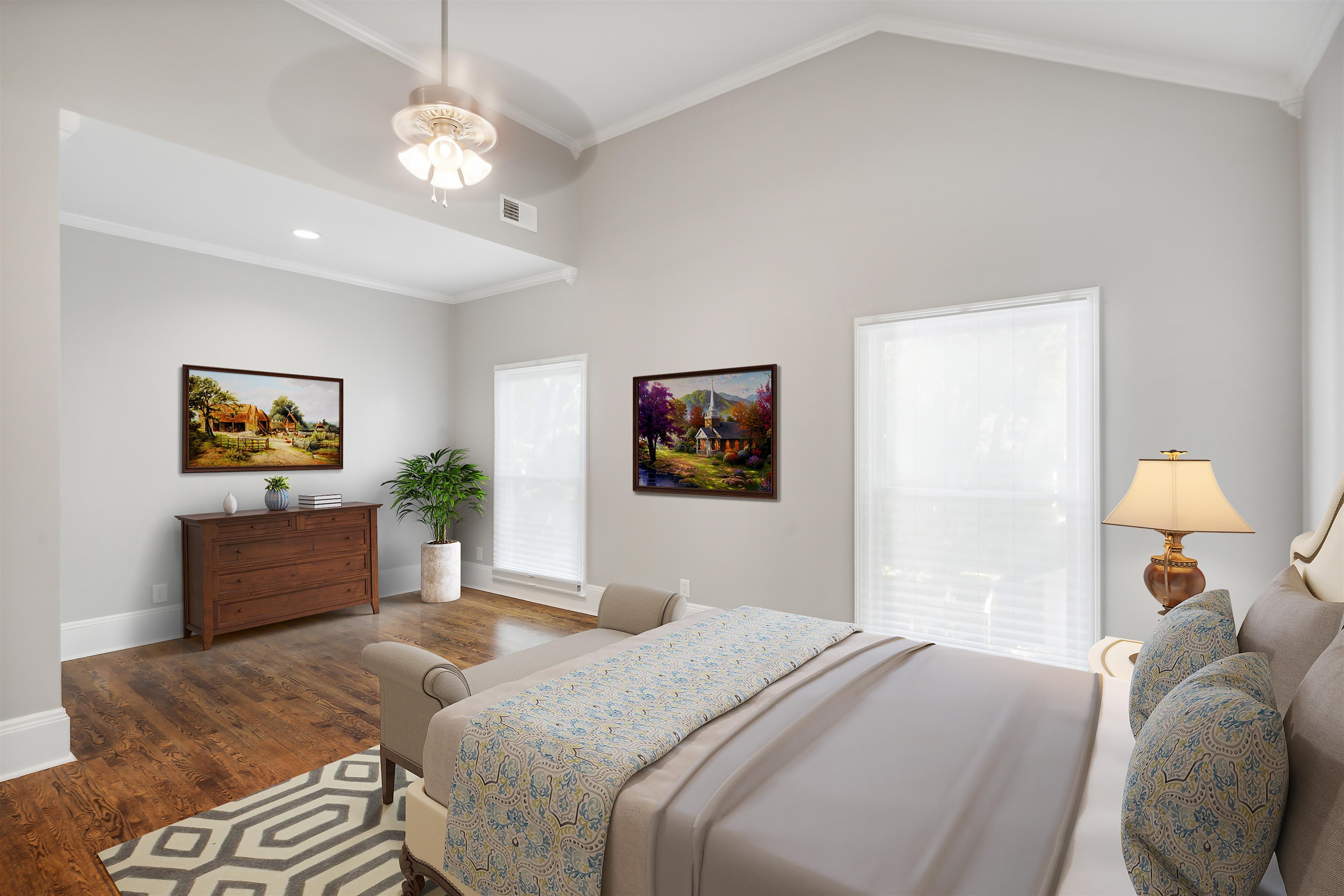 Primary room featuring high vaulted ceiling, ornamental molding, and dark wood flooring