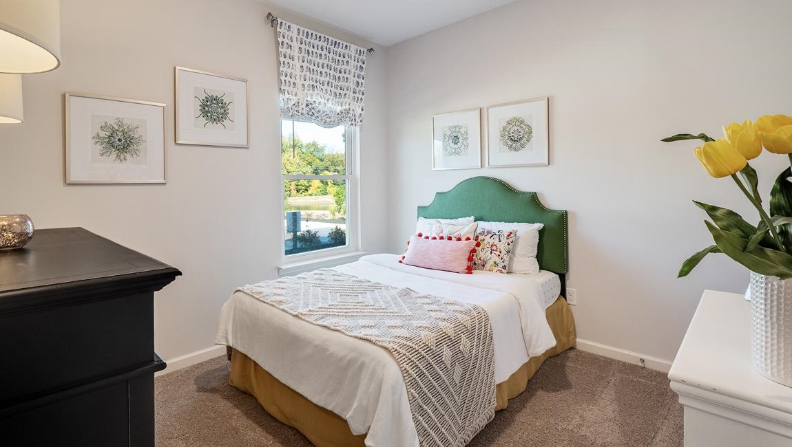 Bedroom featuring carpet flooring