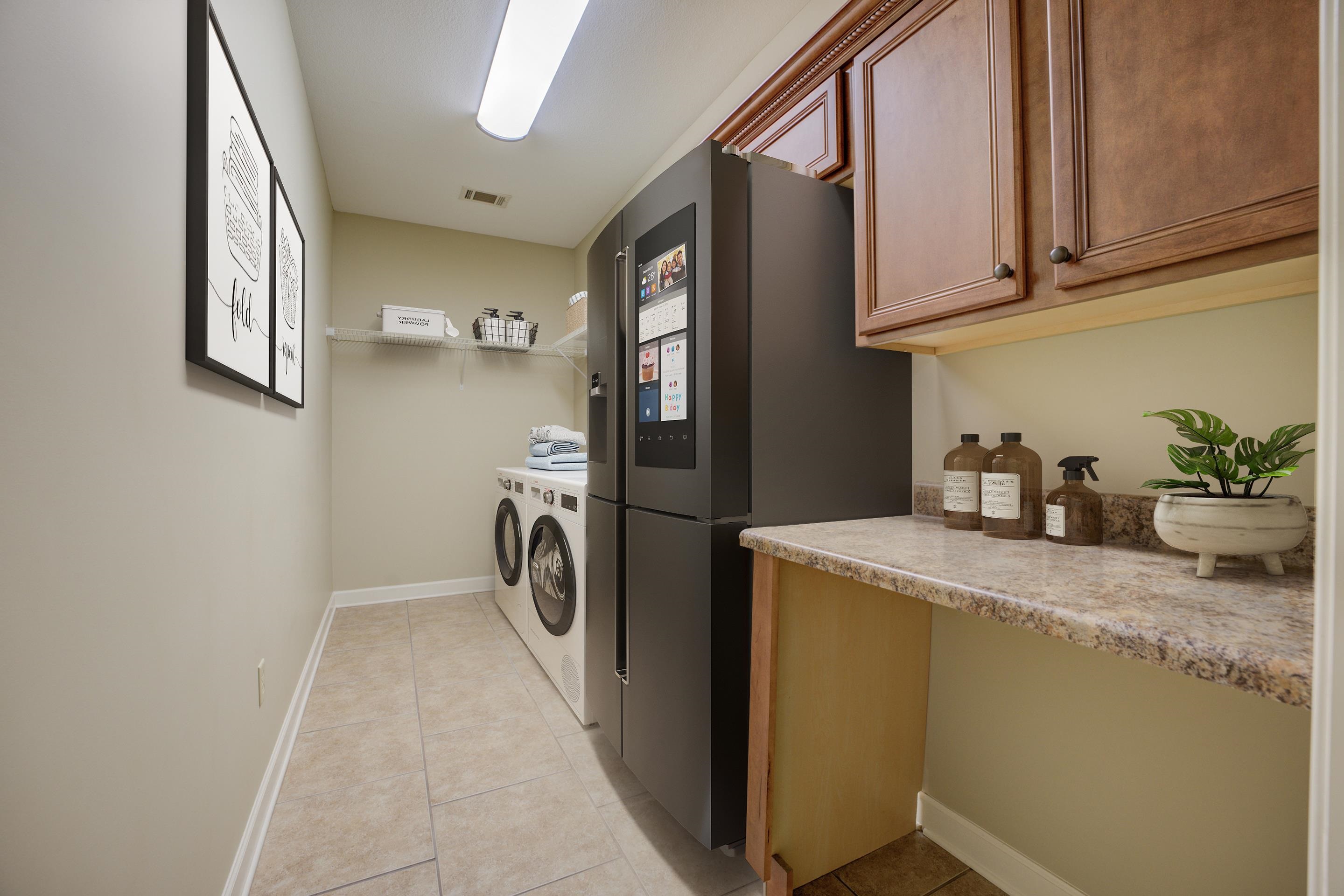 LARGE Laundry room with Cabinets For Additional Storage and Counter Tops! Room For Your Freezer!