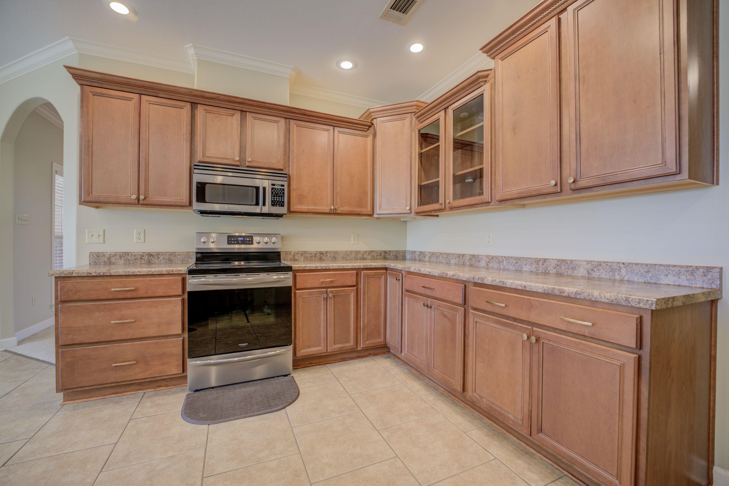 There is Lots of Cabinets and Recessed Lighting!