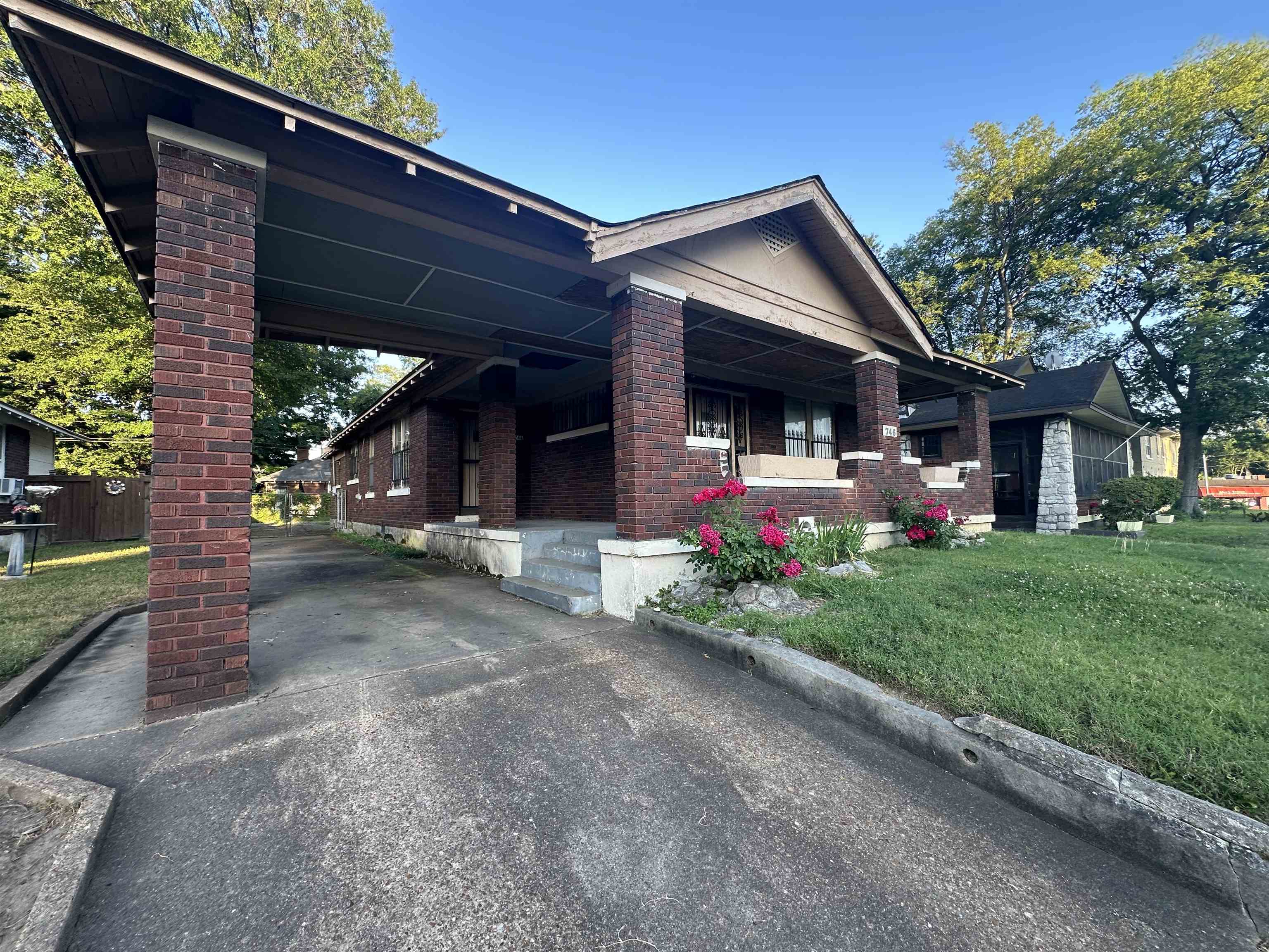 View of home\'s exterior featuring a yard