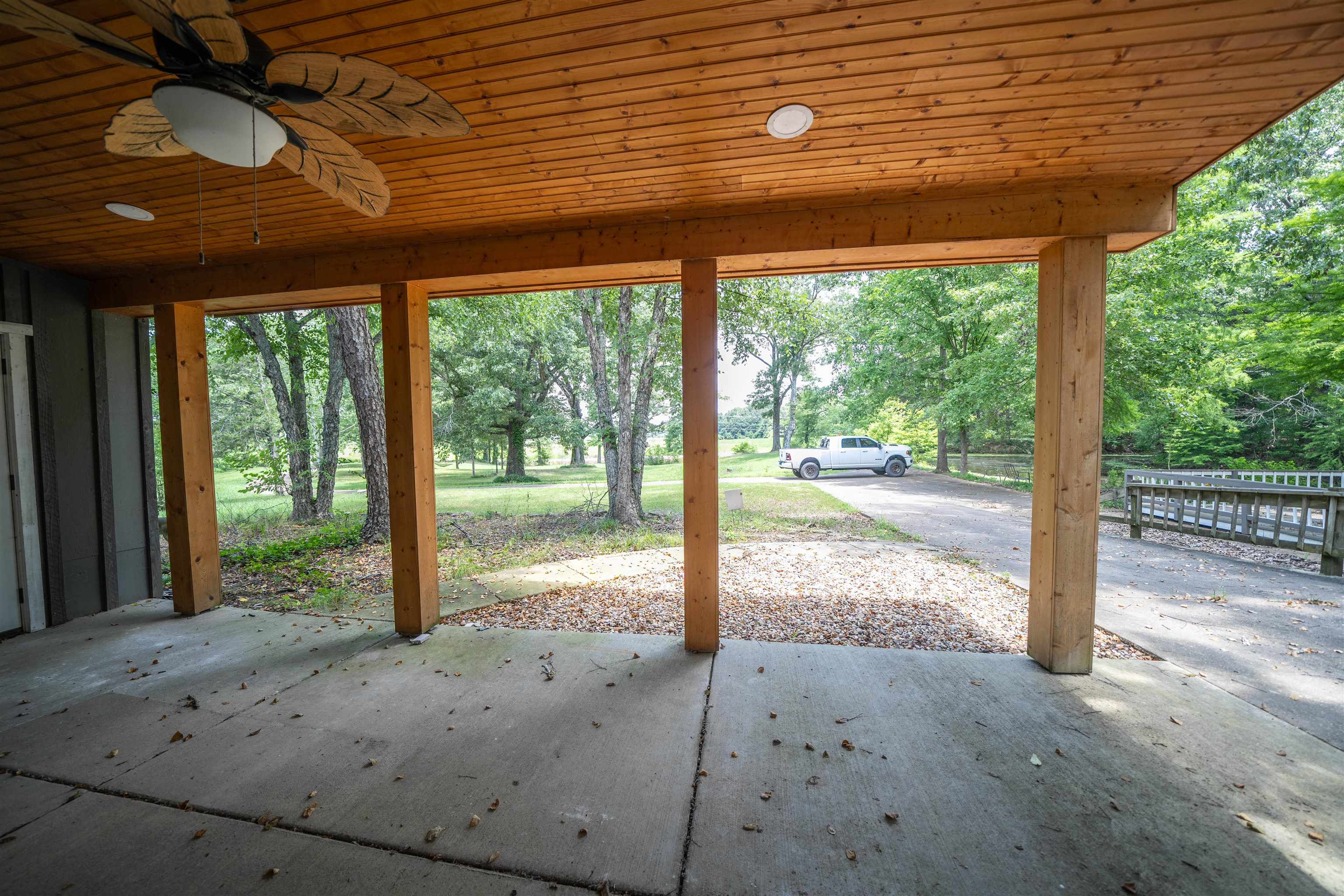 View of terrace featuring ceiling fan