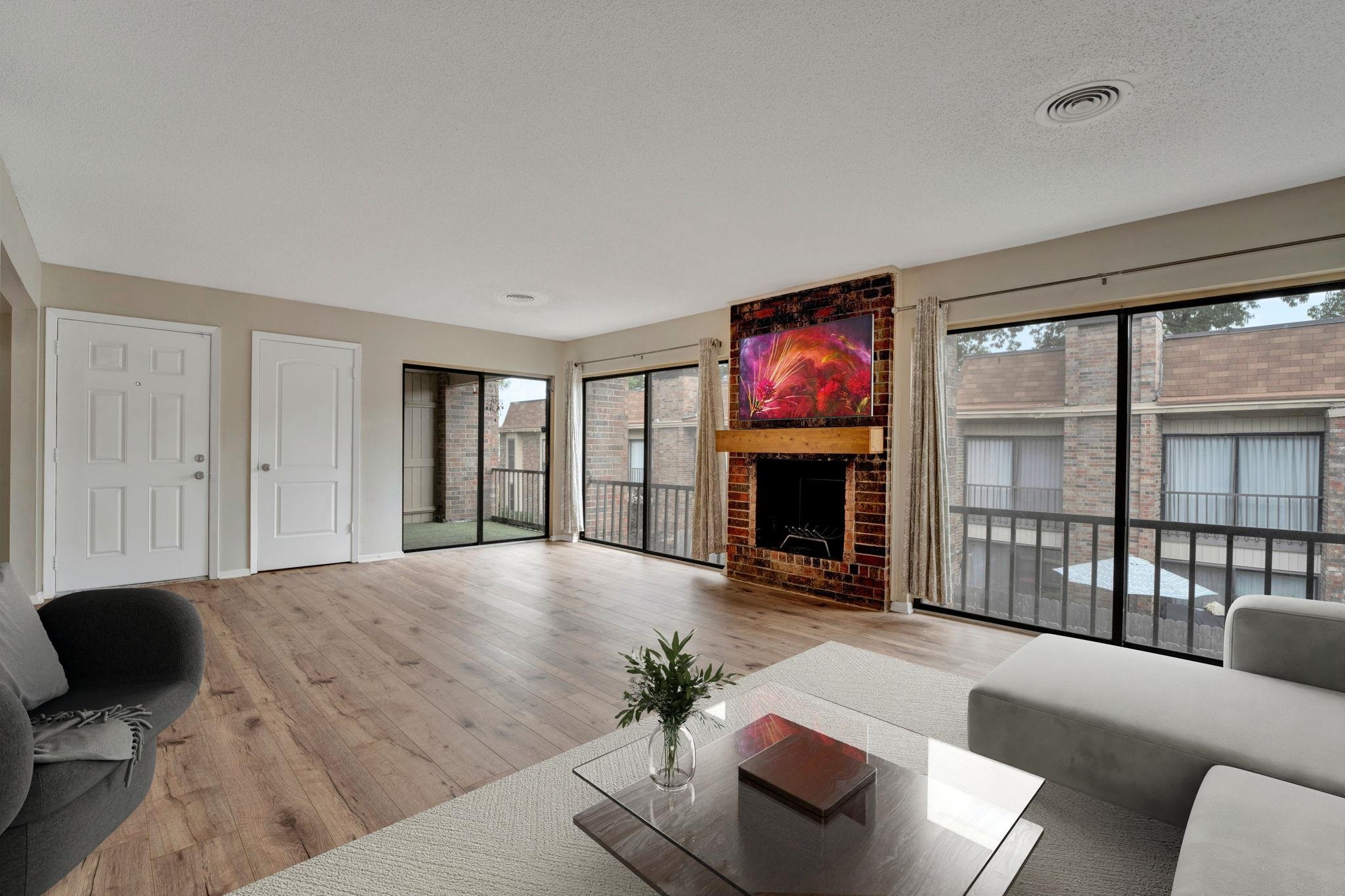 Living room featuring hardwood / wood-style floors and a fireplace