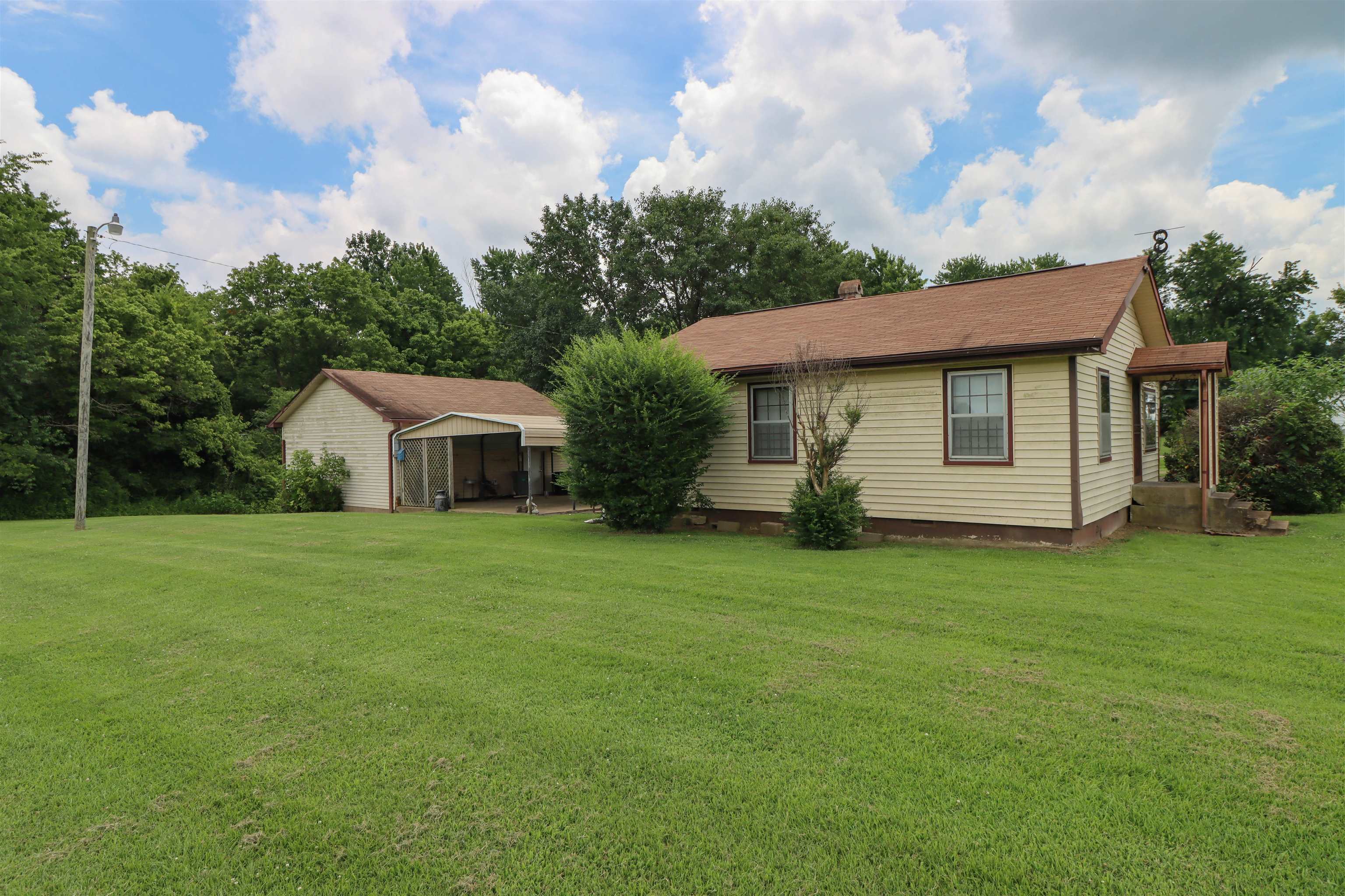 View of front of home with a front lawn