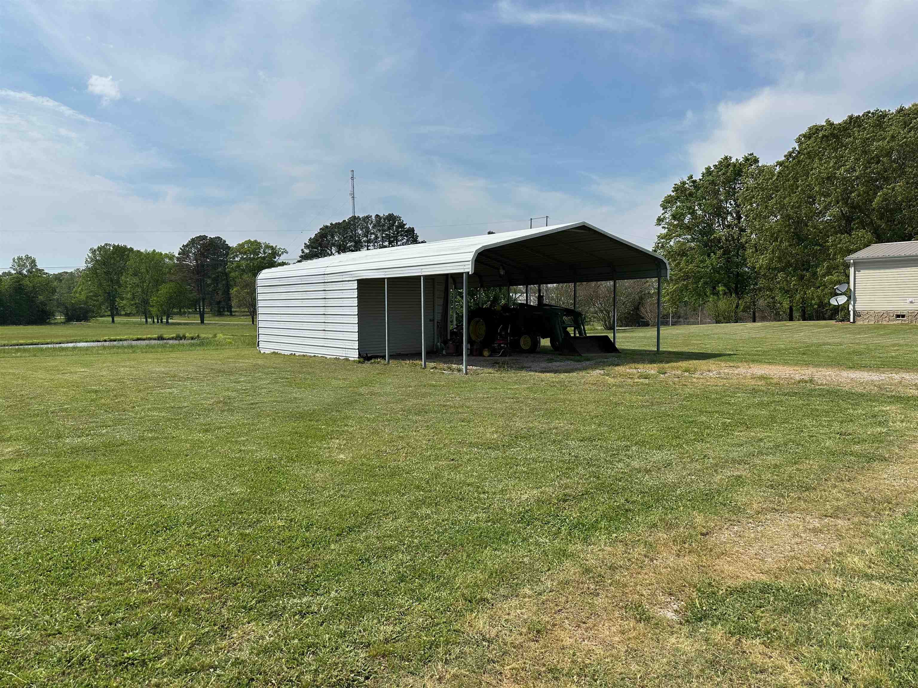 Exterior space with a carport