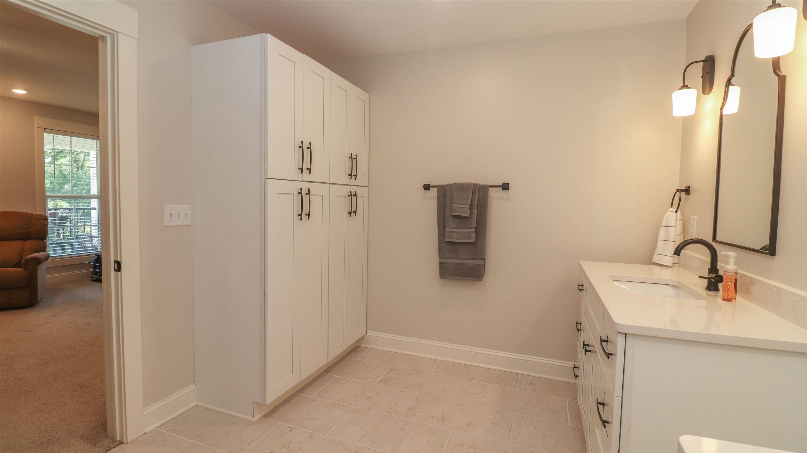 Bathroom featuring vanity and tile patterned flooring