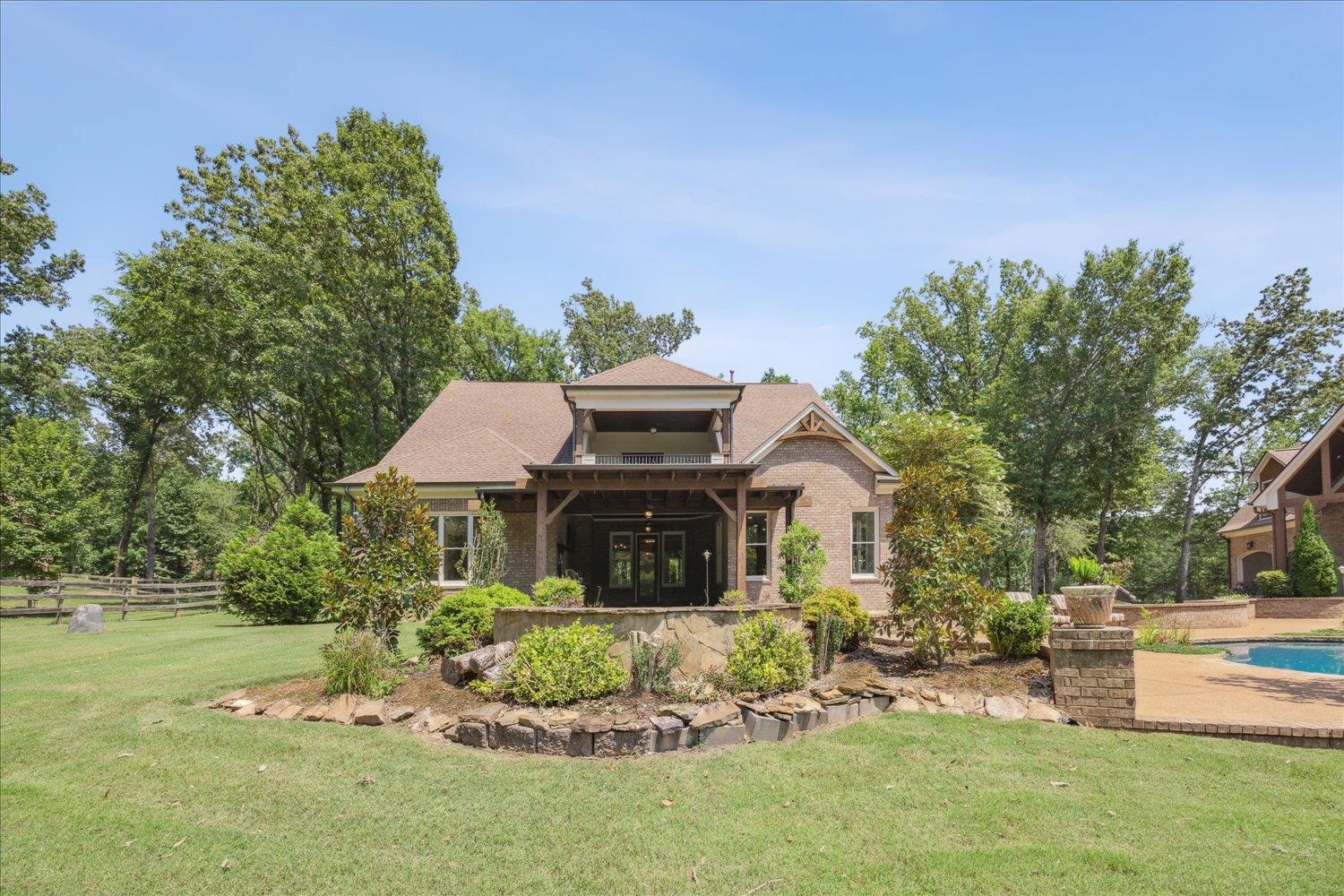 This pool house can be just that or...a perfect in-law suite with an attached 2 car garage, kitchenette, large den downstairs and spacious Bonus Room up and a Bedroom.