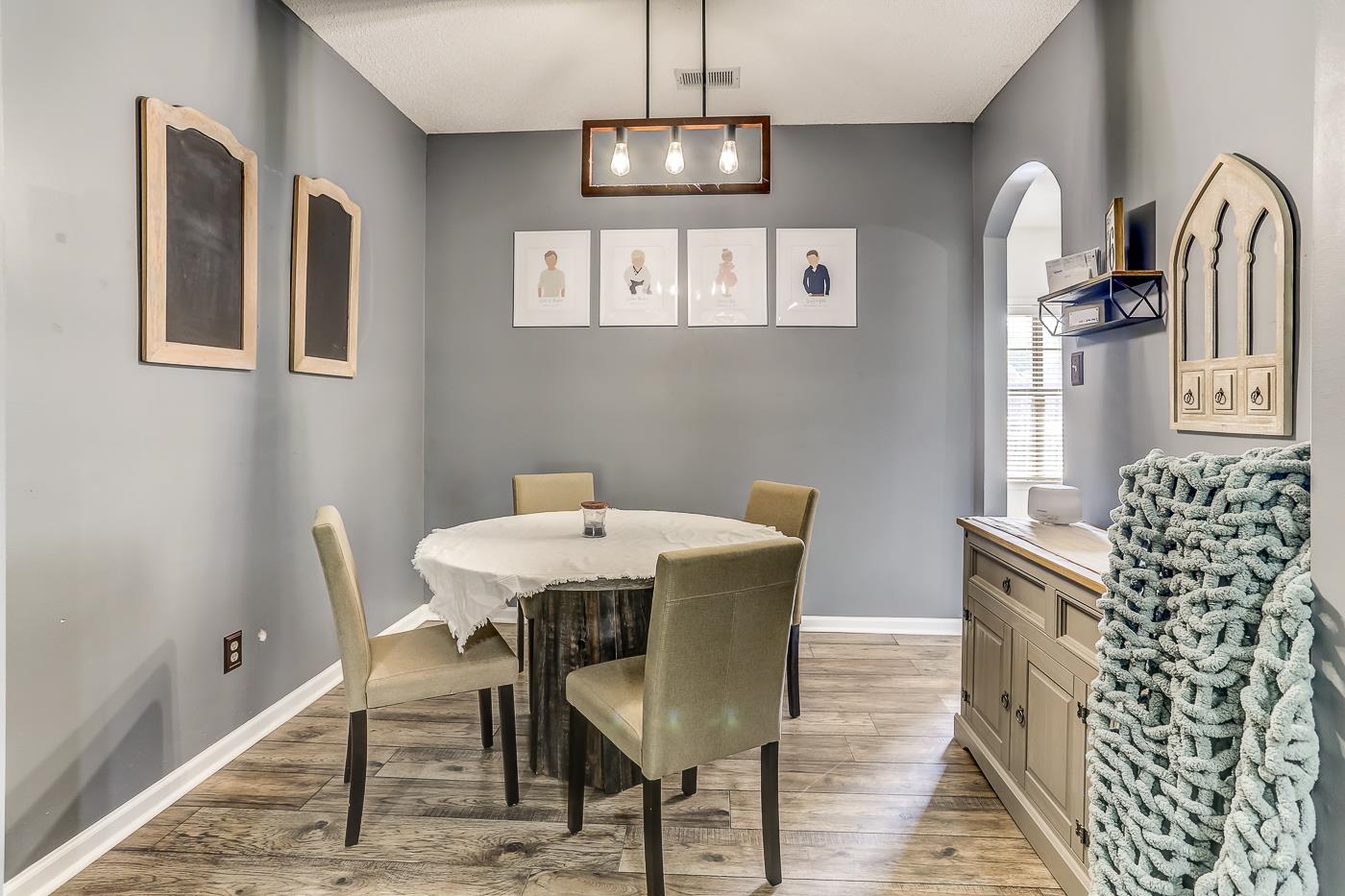 Dining space with wood-type flooring