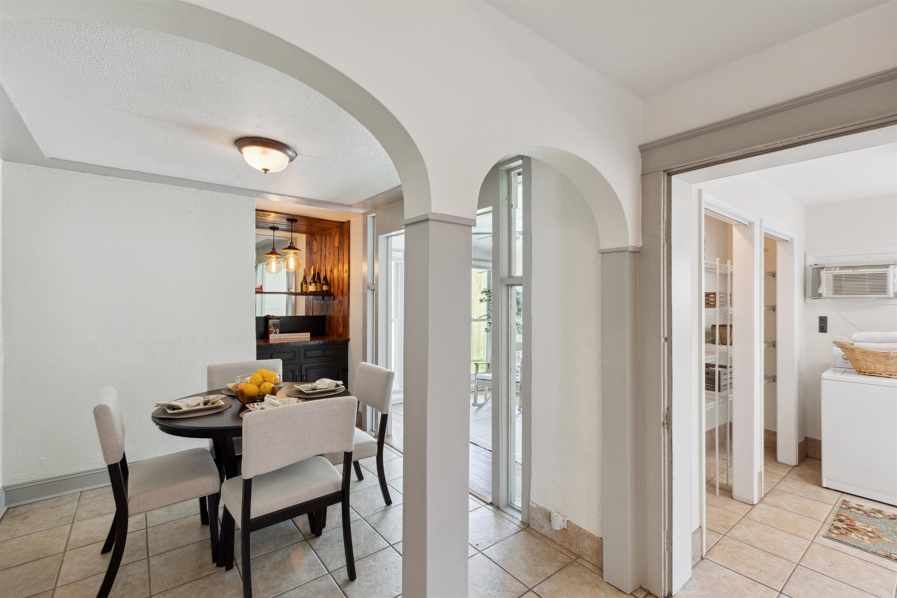 Convenient dining area with custom bar nook.