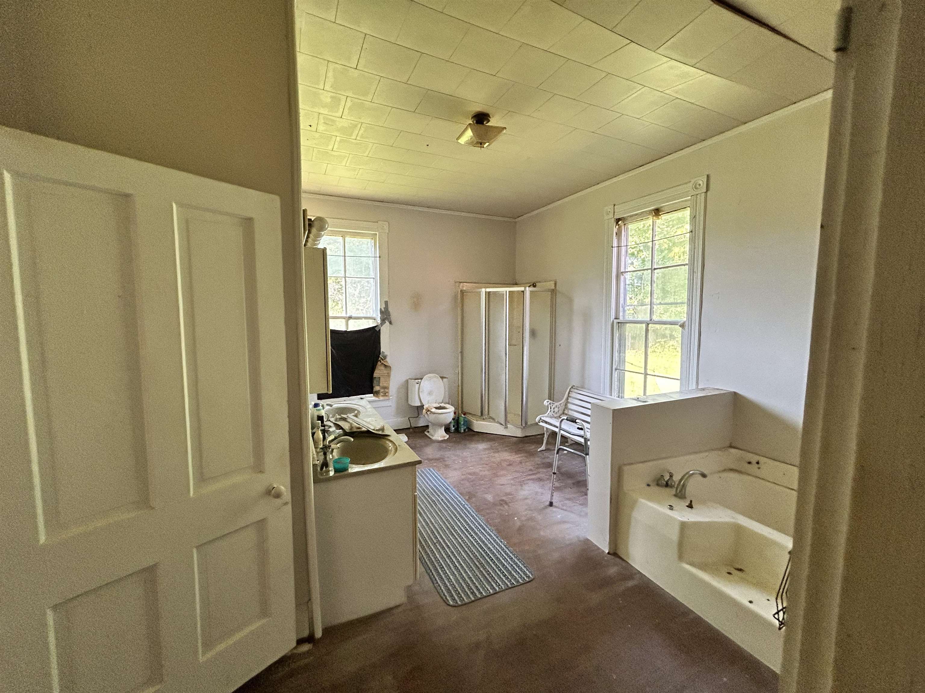 Bathroom with plus walk in shower