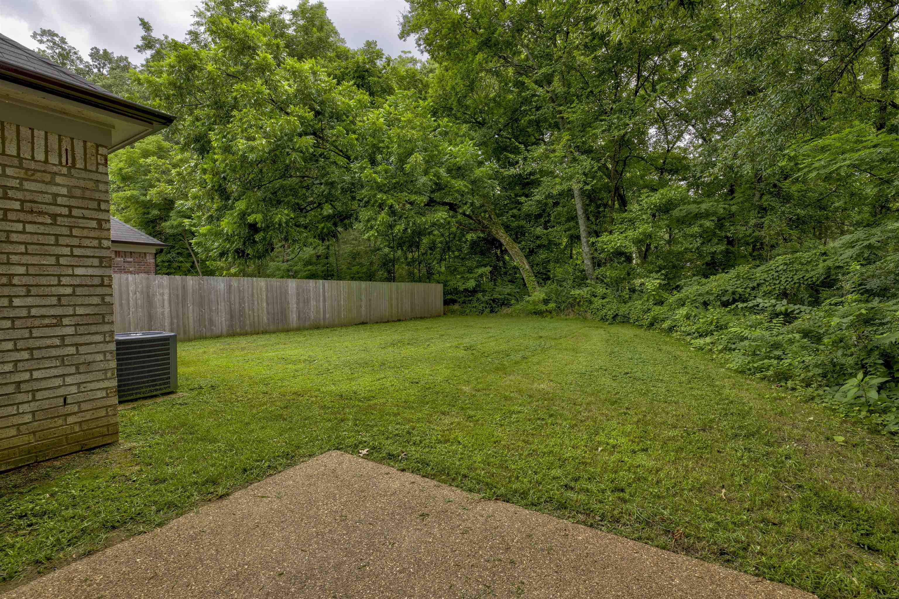 View of yard featuring cooling unit