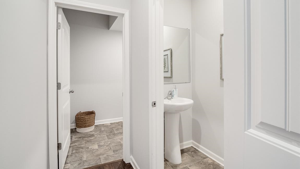 Bathroom with tile patterned flooring