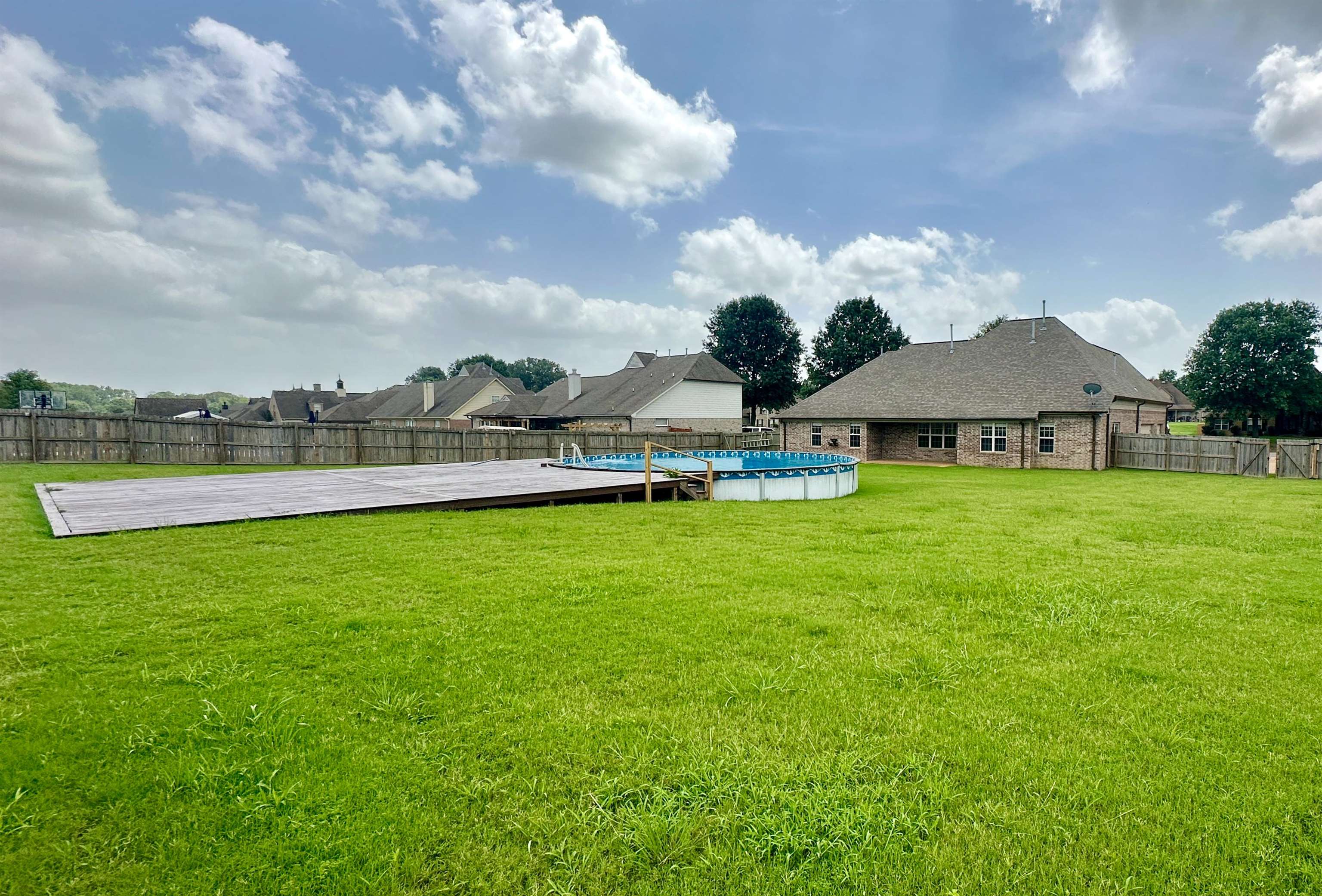 A private and fenced backyard to enjoy while entertaining.