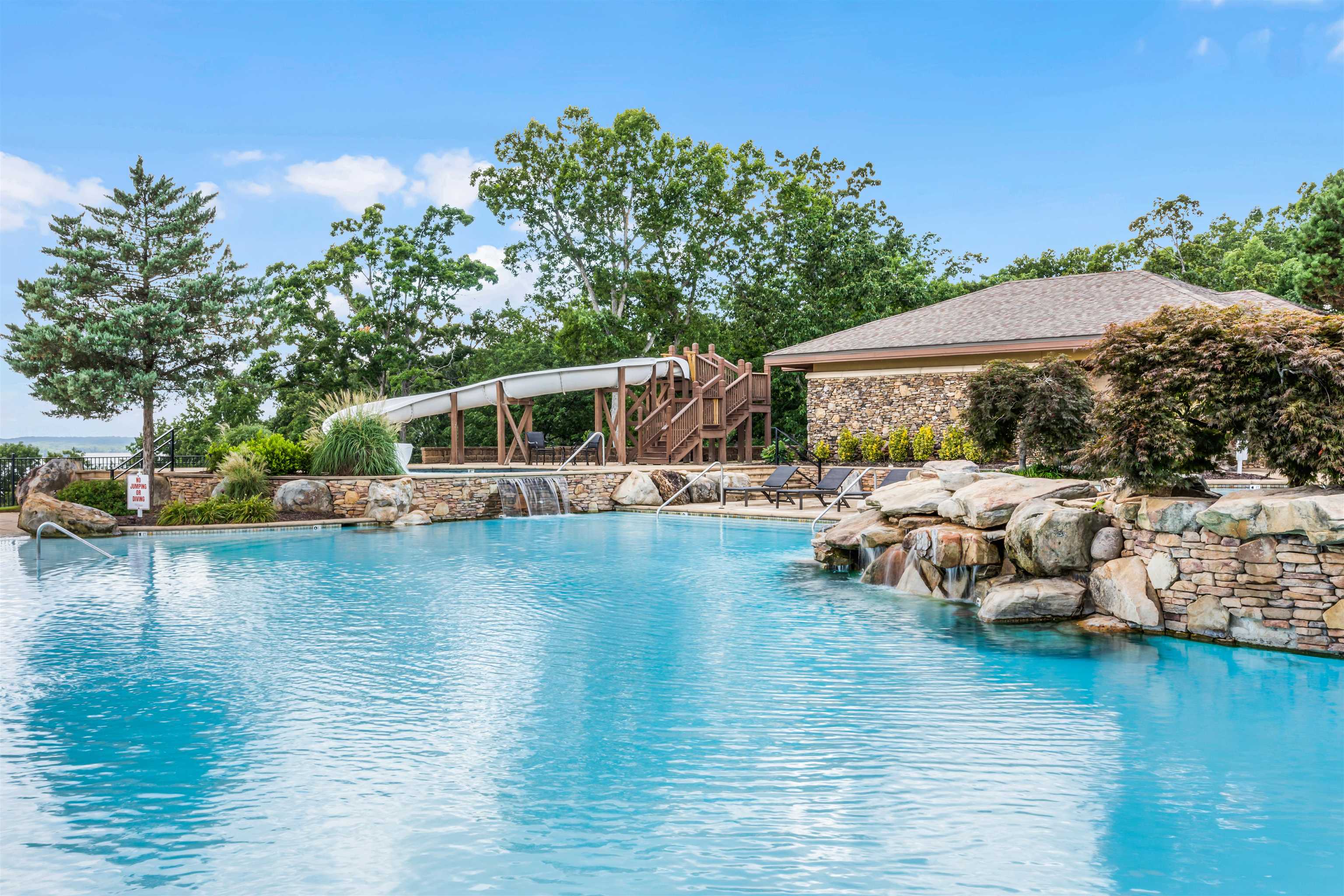 View of pool featuring pool water feature