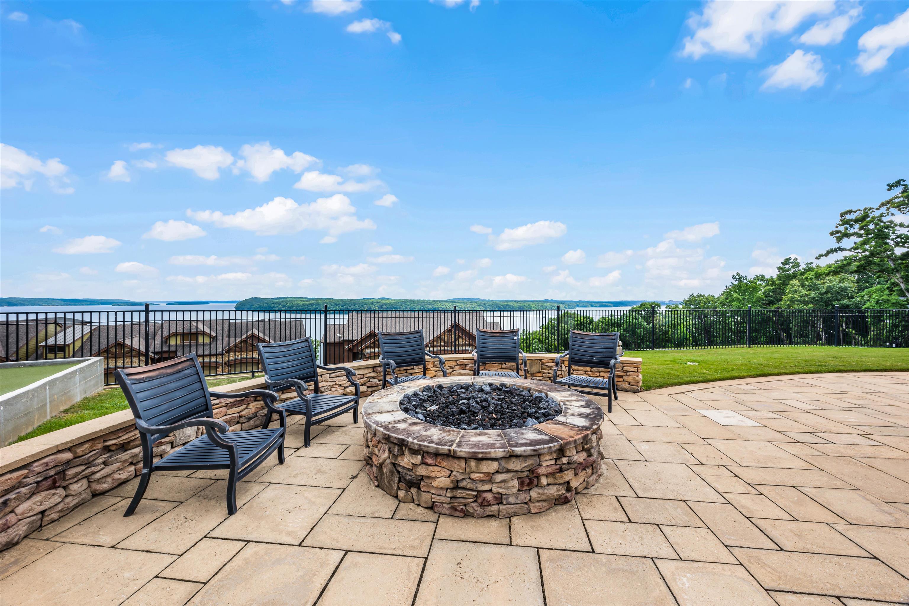 View of patio featuring a fire pit