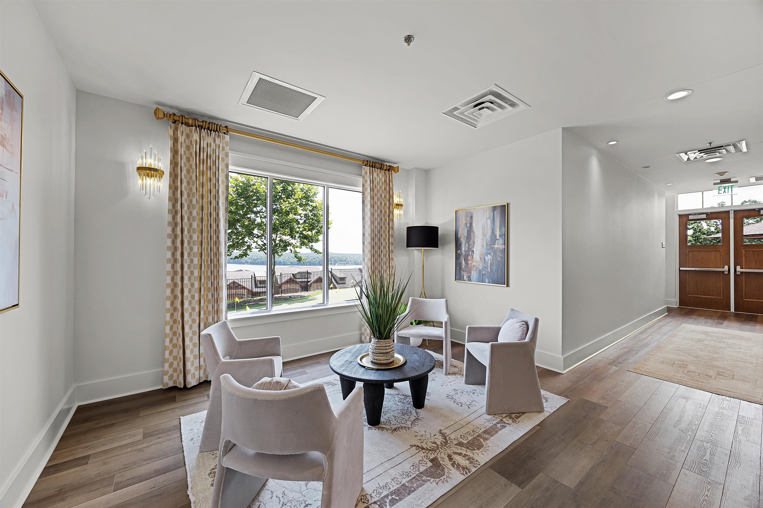 Living area with hardwood / wood-style floors