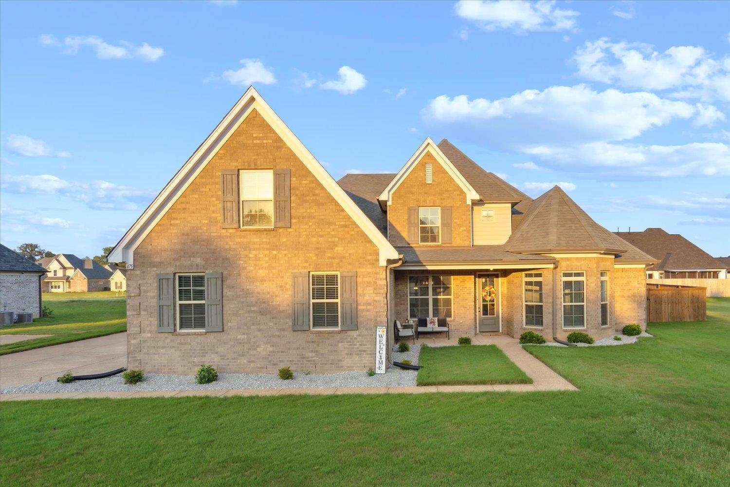 View of front of home featuring a front lawn