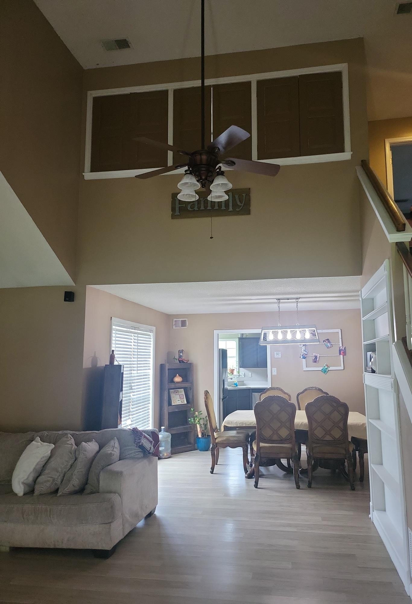 Living Room featuring ceiling fan and hardwood / wood-style flooring