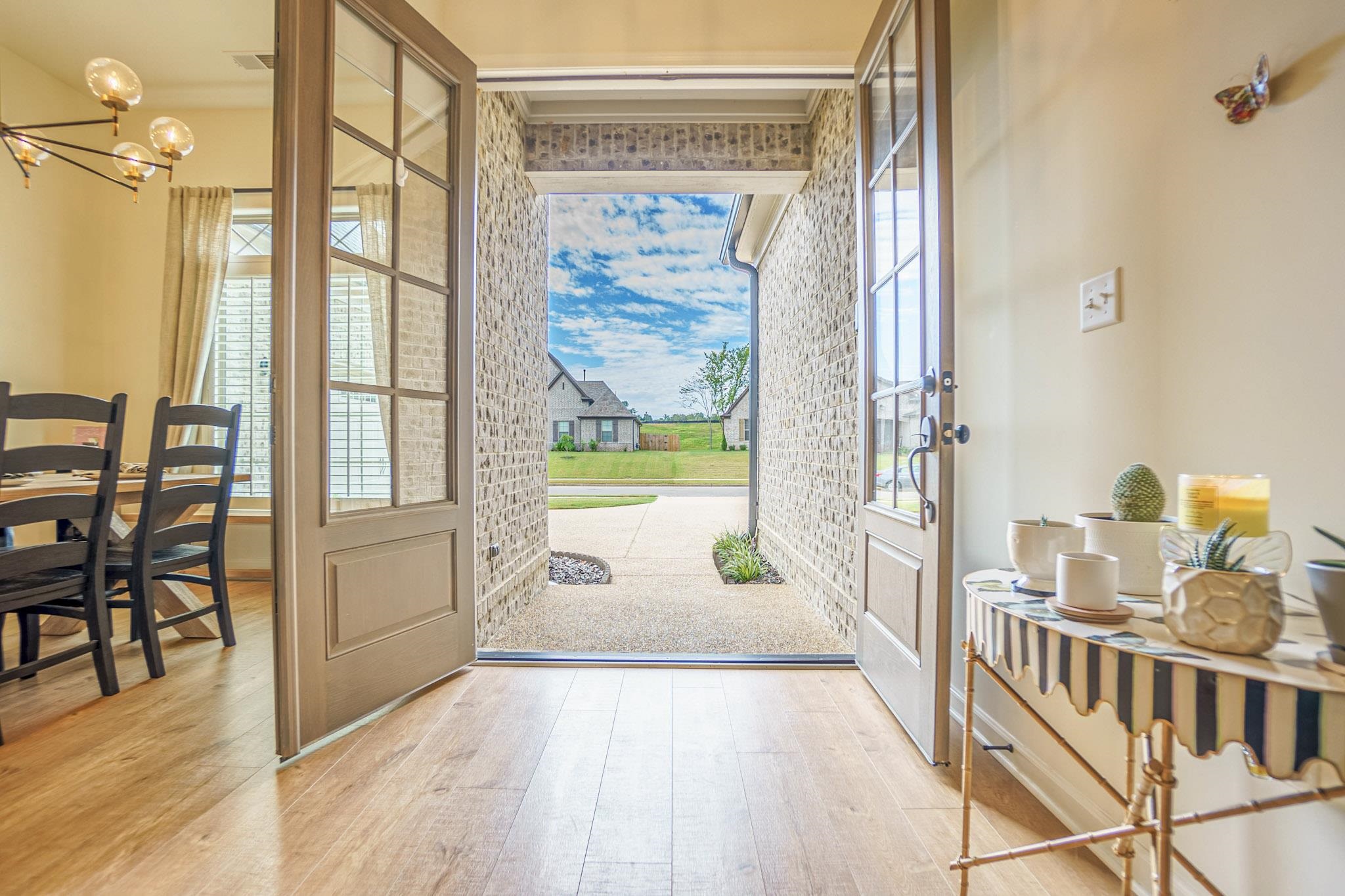 Foyer featuring a chandelier and light hardwood / wood-style floors