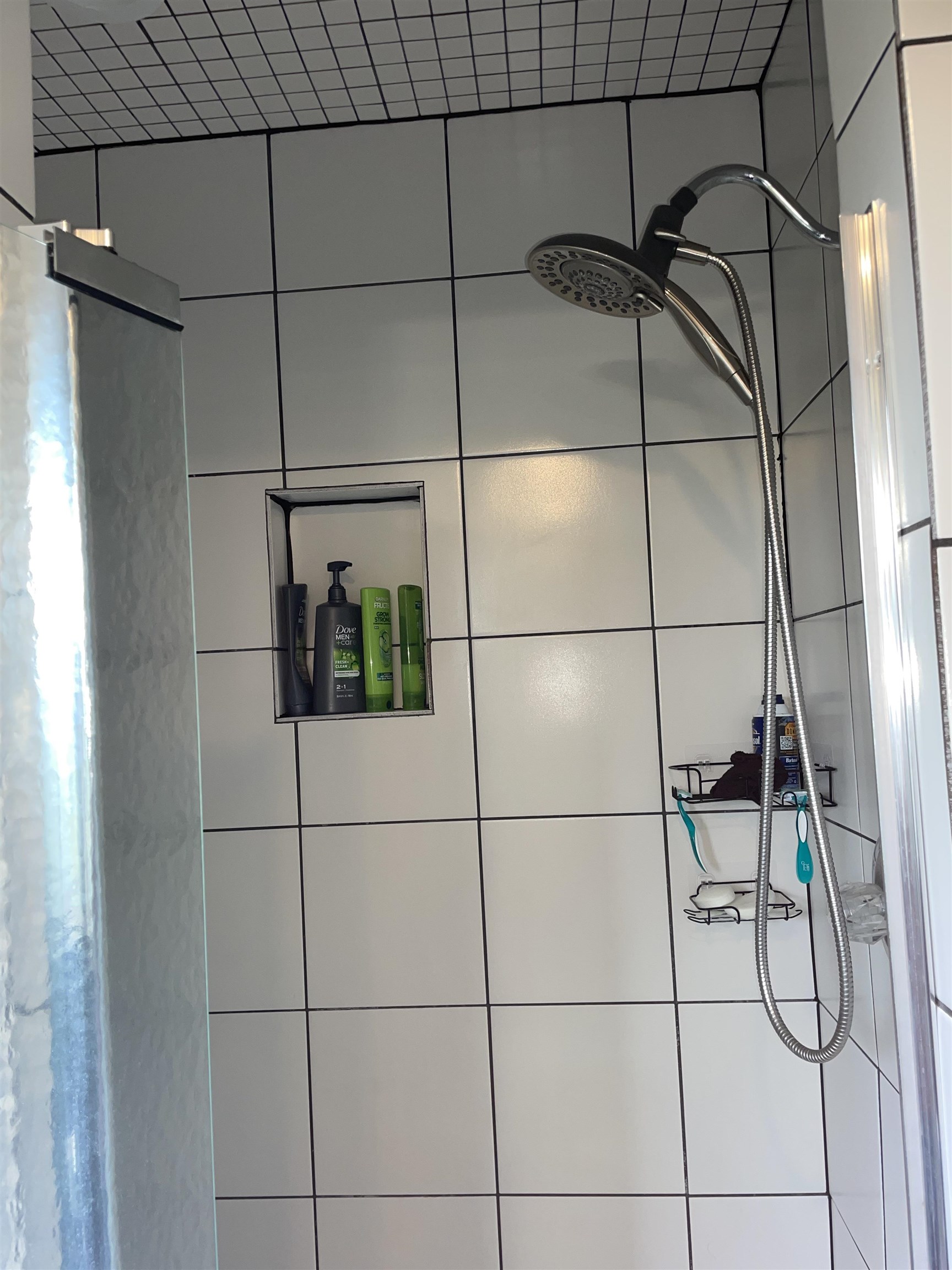 Details with a tile shower