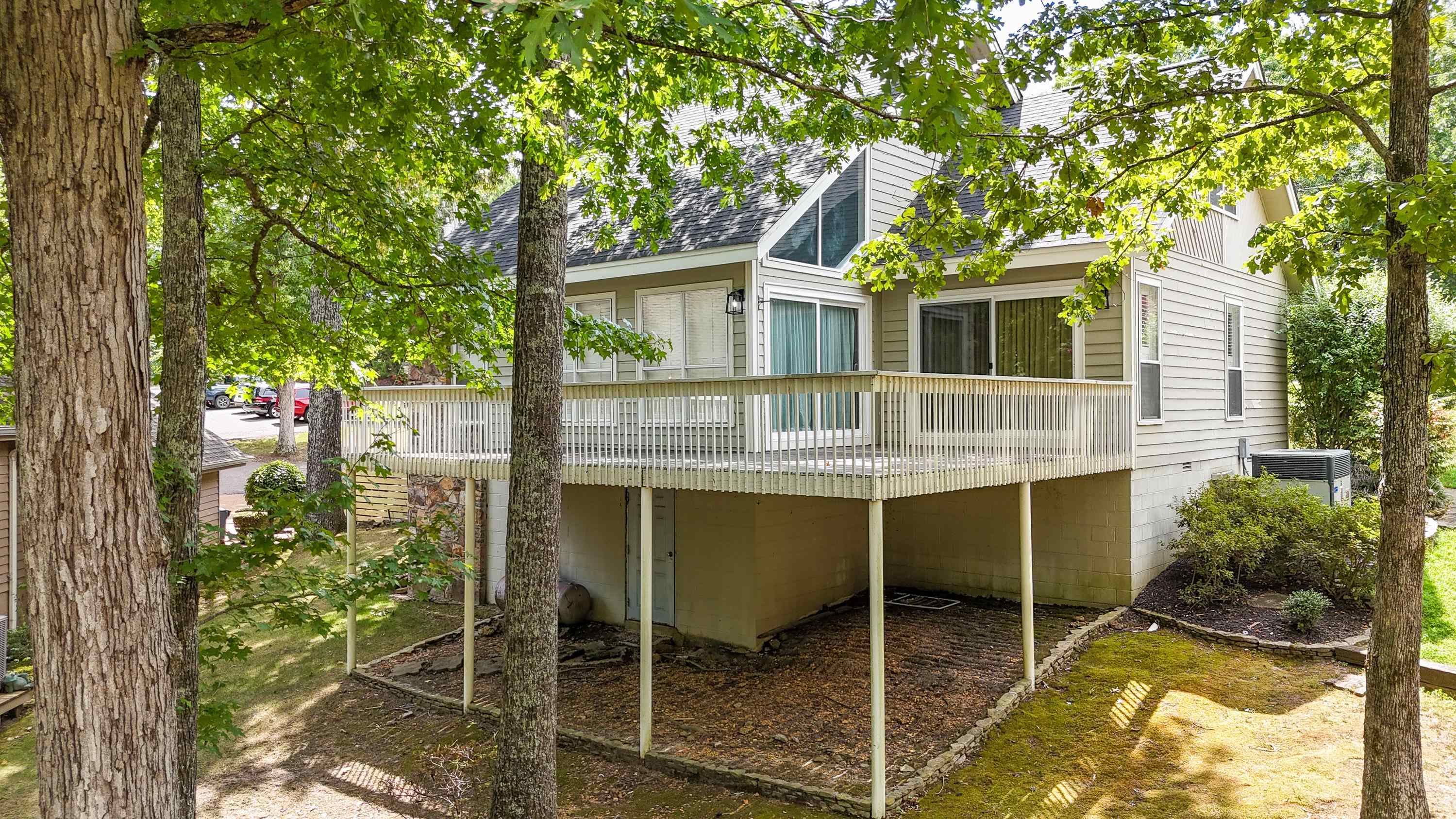 Rear view of house with a deck