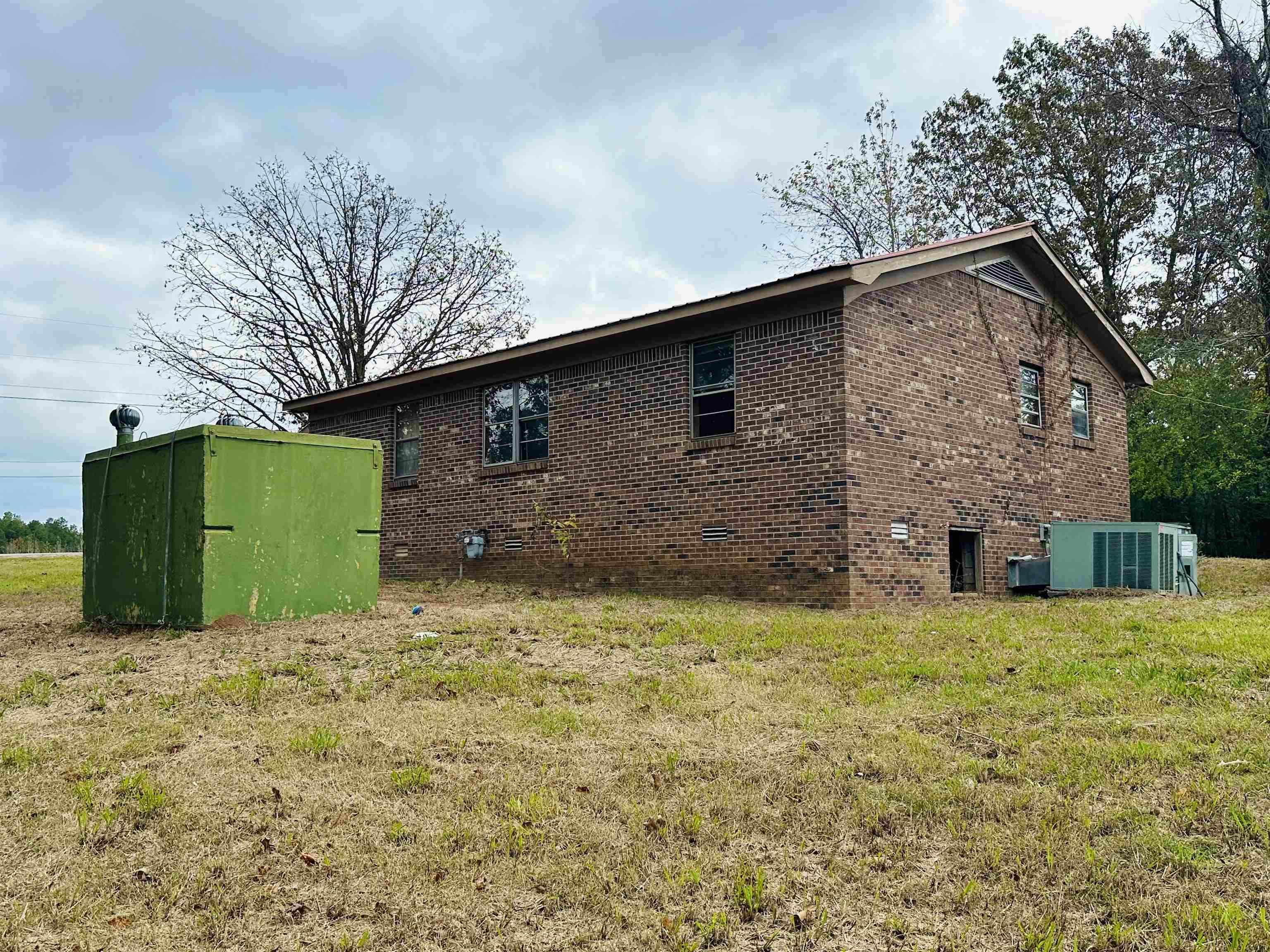 Exterior space featuring a storage shed