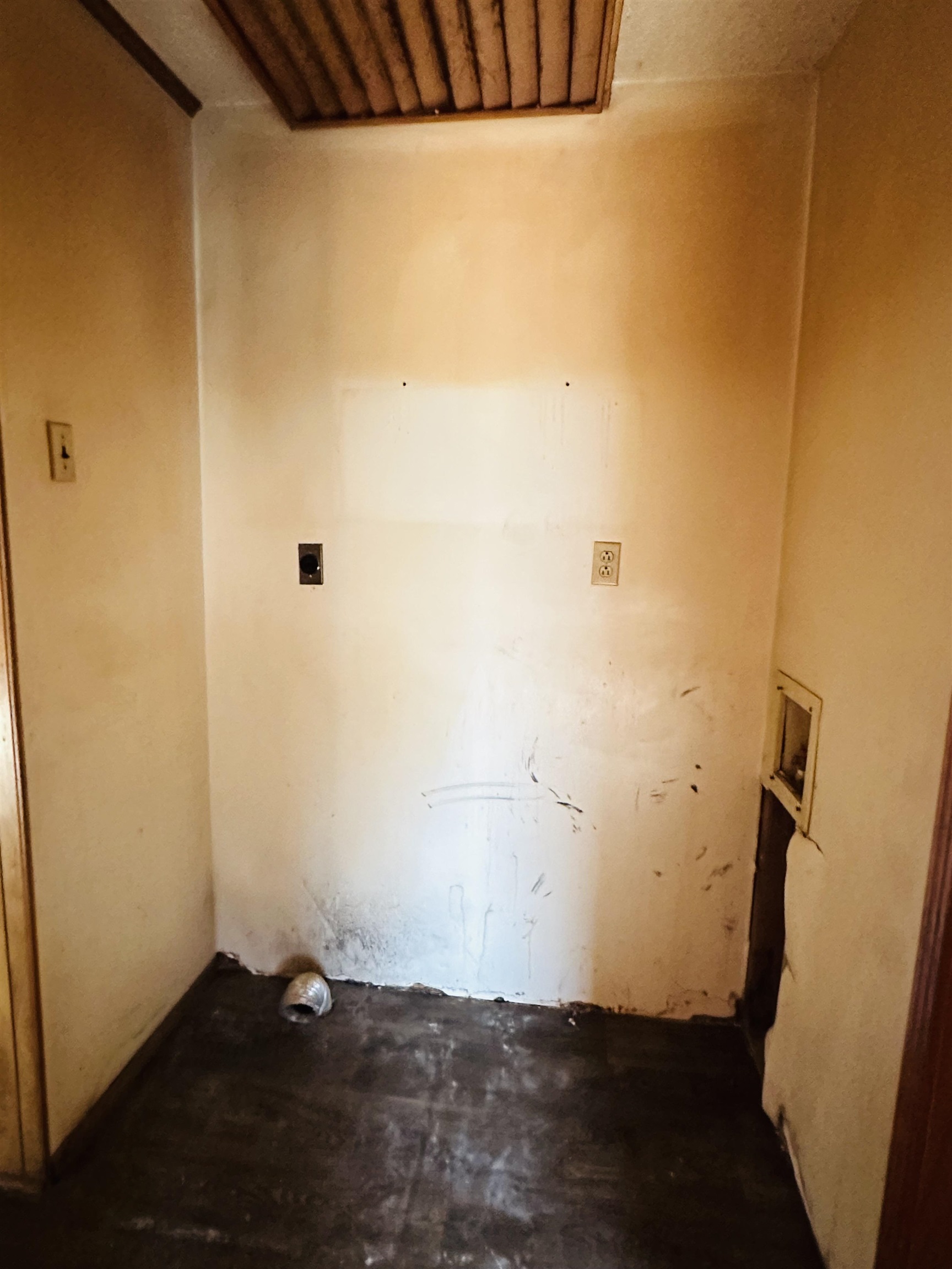 Laundry room featuring hookup for a washing machine and hookup for an electric dryer