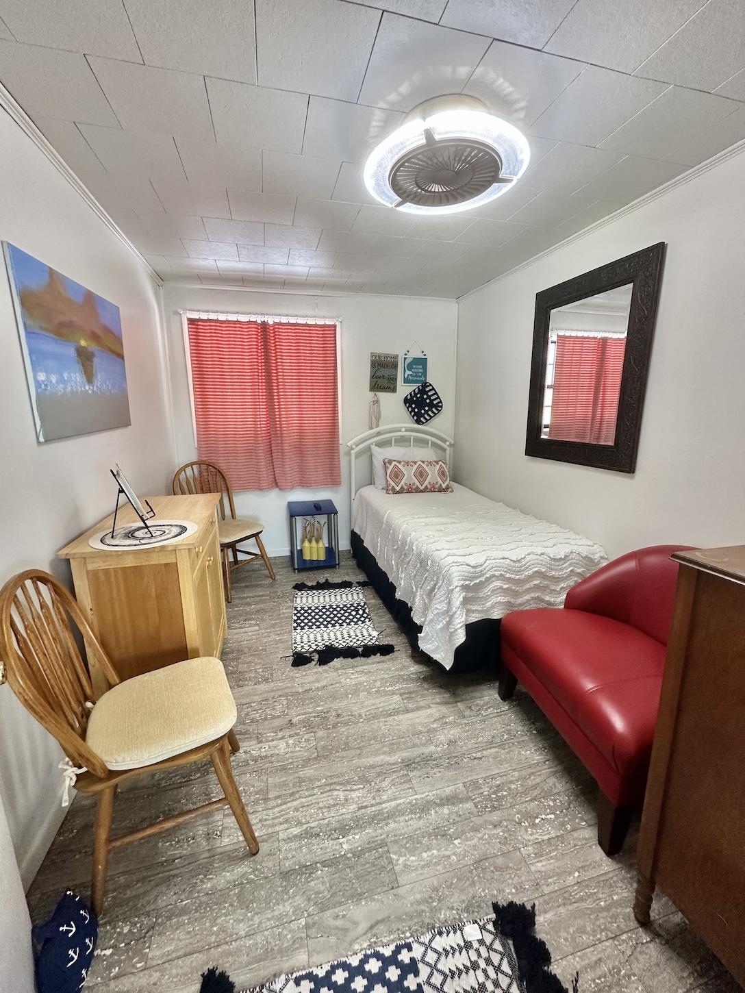 Bedroom featuring crown molding and hardwood / wood-style floors