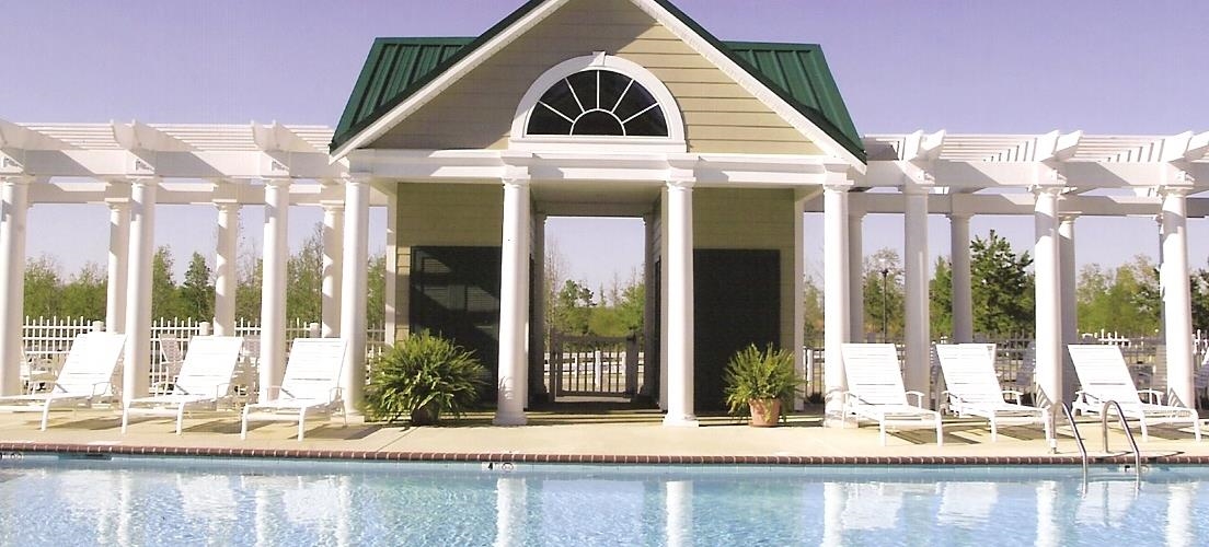 View of pool with a patio and a pergola