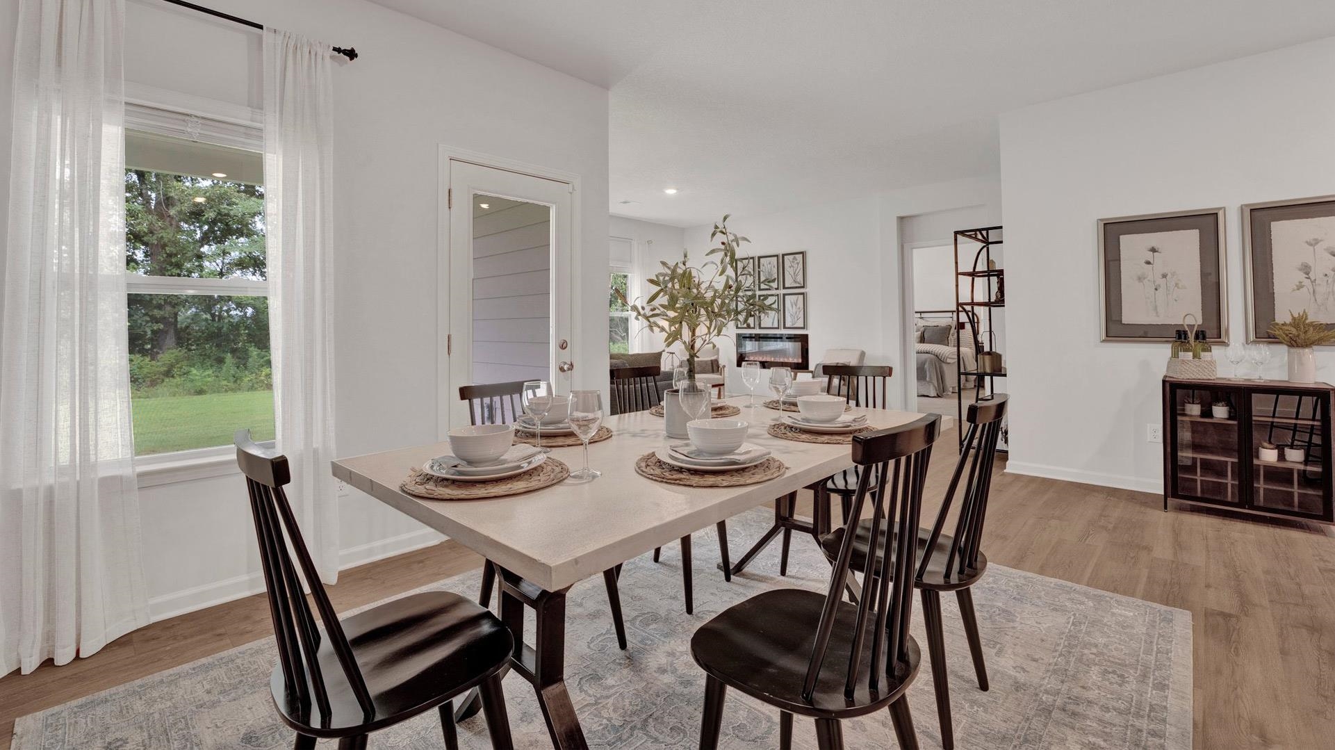 Dining room with wood-type flooring