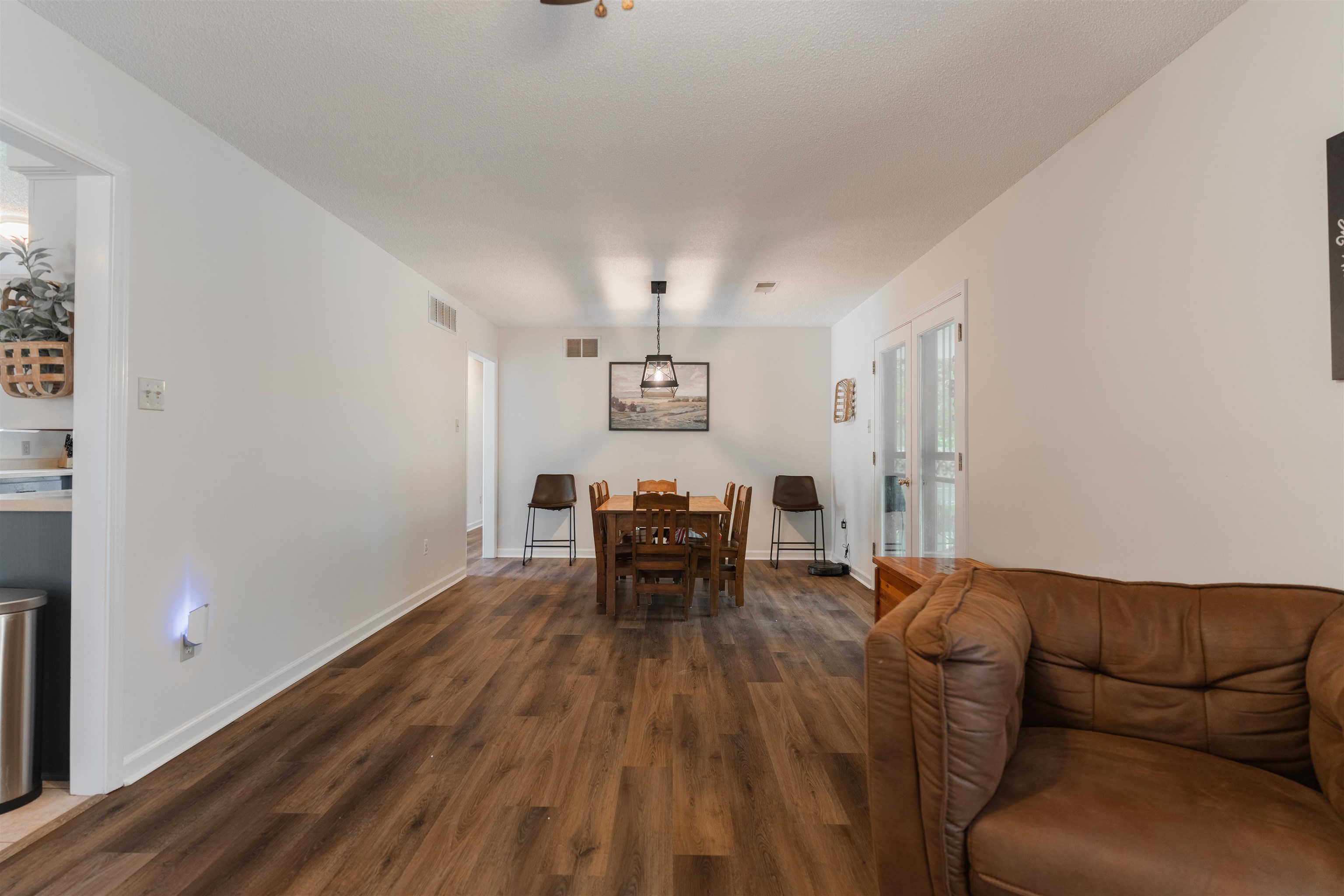 Living room featuring dark hardwood / wood-style floors