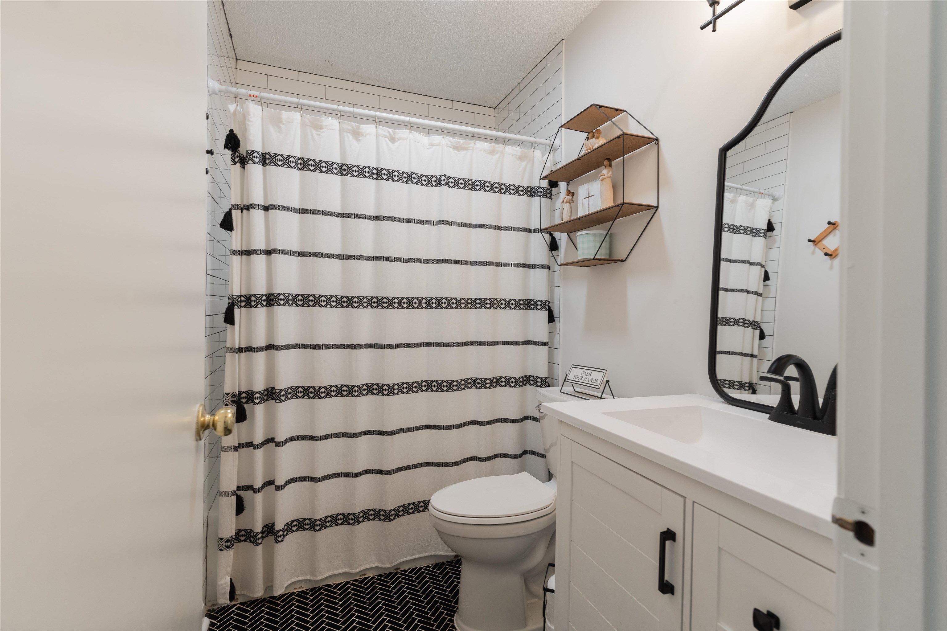 Renovated Bathroom with vanity and toilet