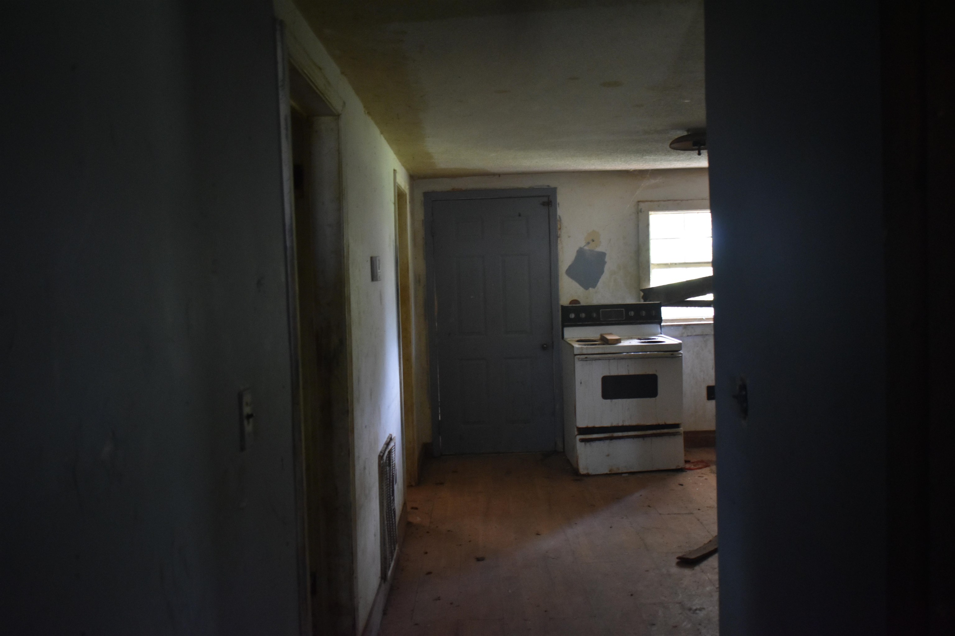 Kitchen featuring white electric stove