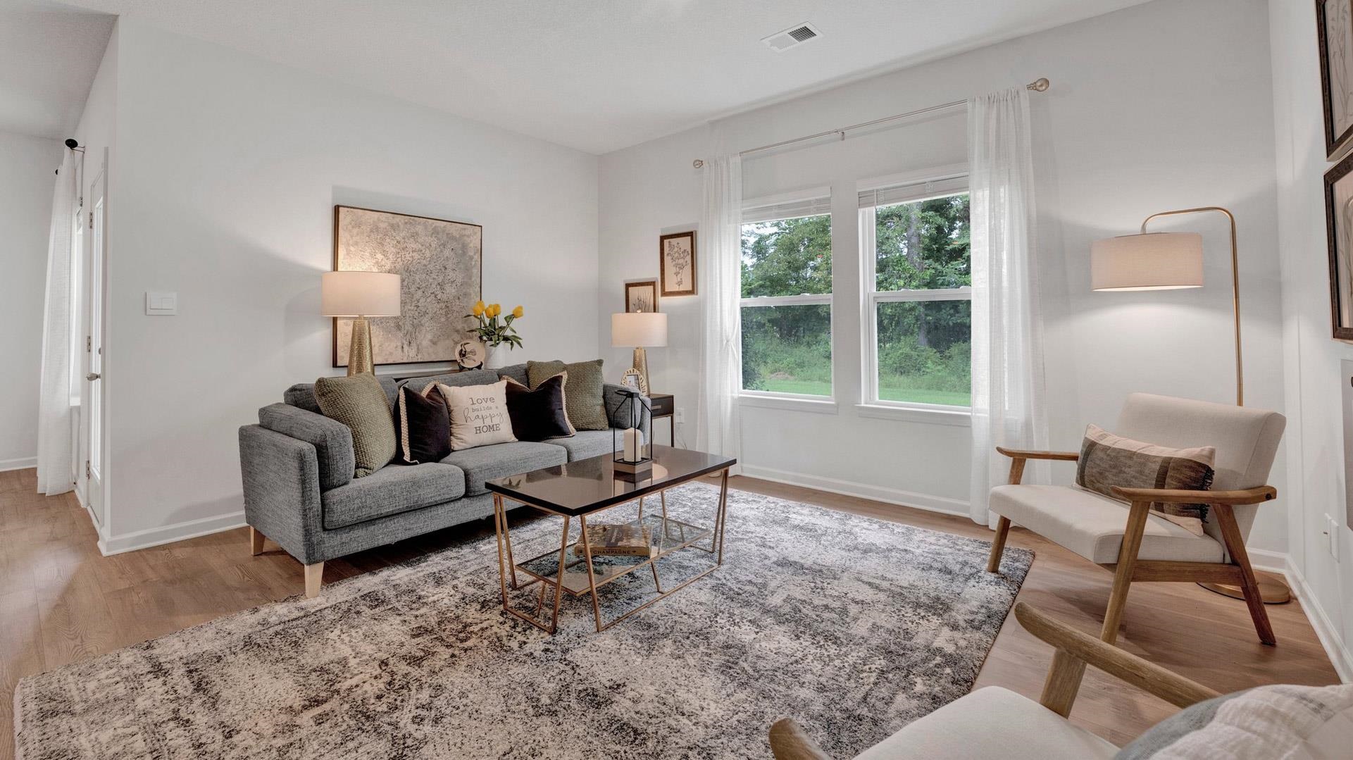 Living room with wood-type flooring