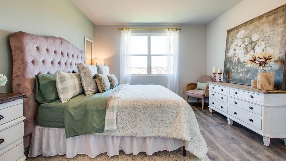 Bedroom featuring wood-type flooring