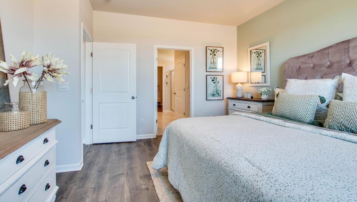 Bedroom featuring dark hardwood / wood-style flooring
