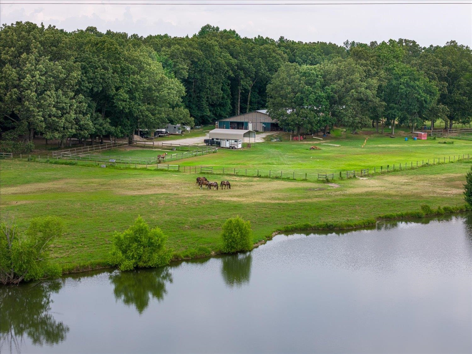 Drone / aerial view with a rural view and a water view
