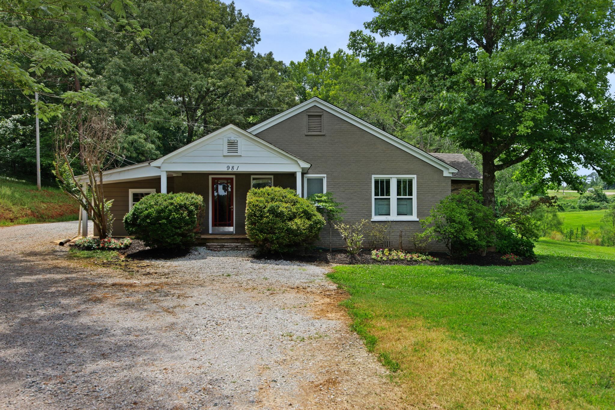 View of front of home featuring a front lawn