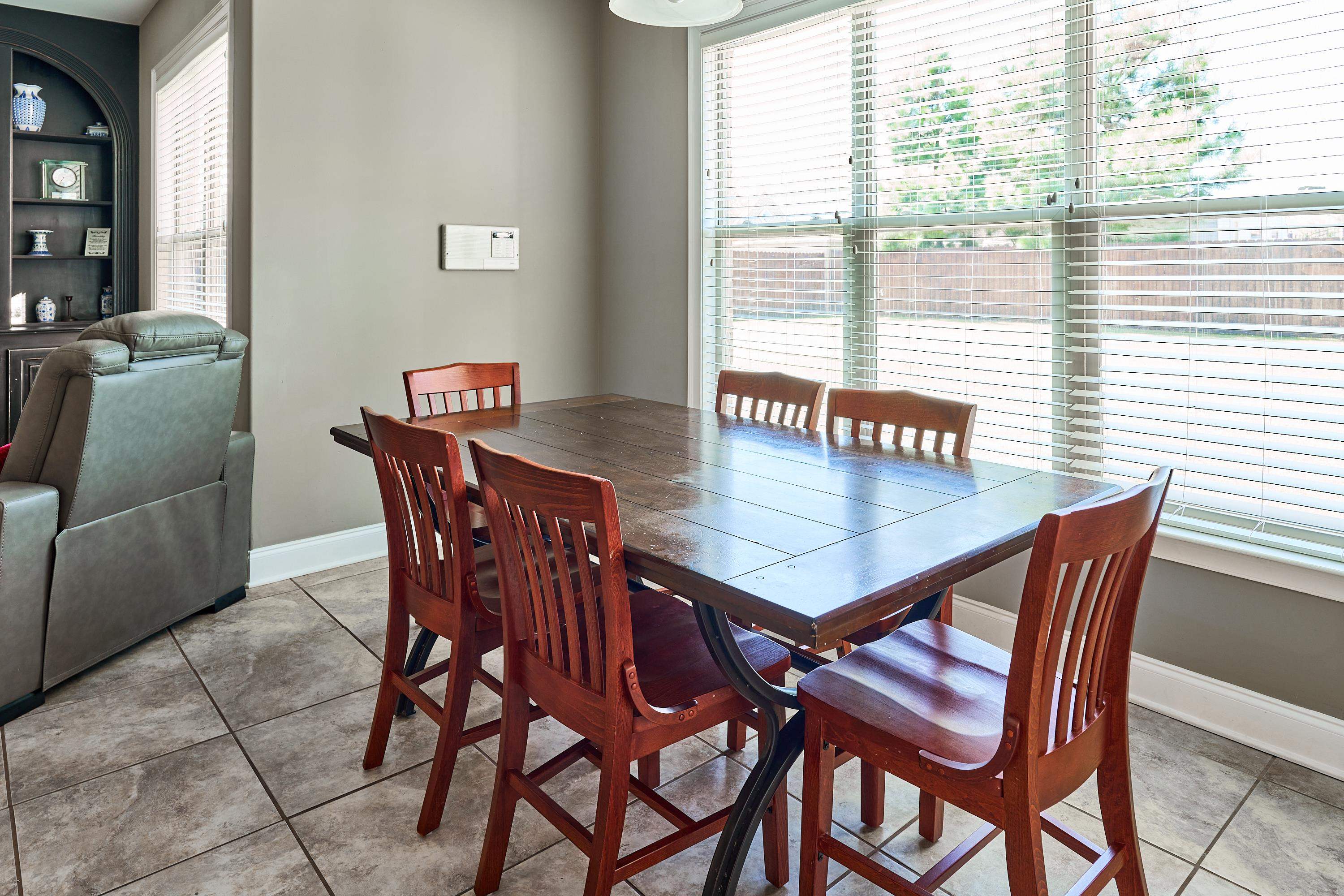 Cozy breakfast nook overlooks back yard.
