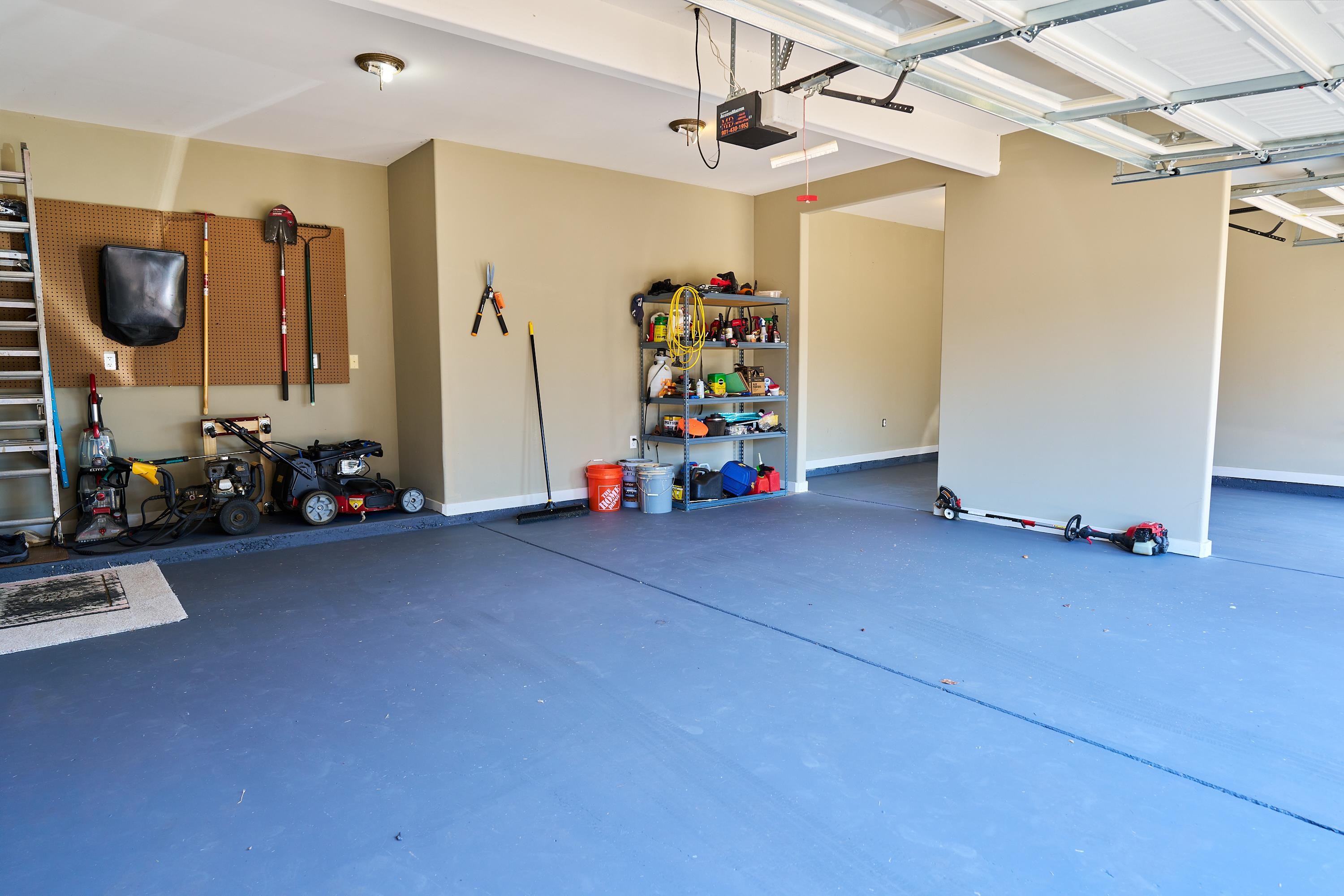 Floor was just painted in the garage.  lots of room for parking and storage.