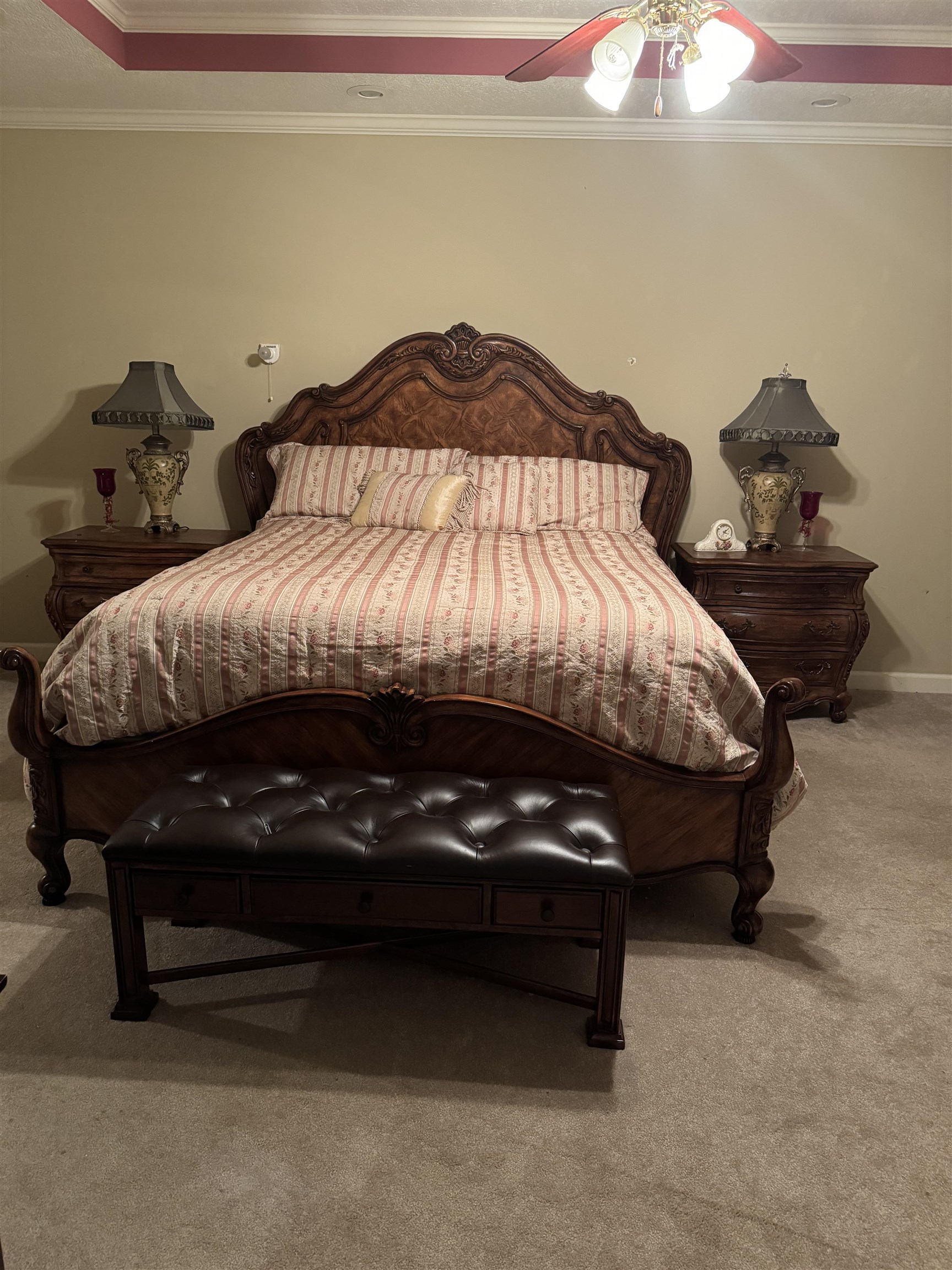 Bedroom with crown molding, carpet flooring, and ceiling fan