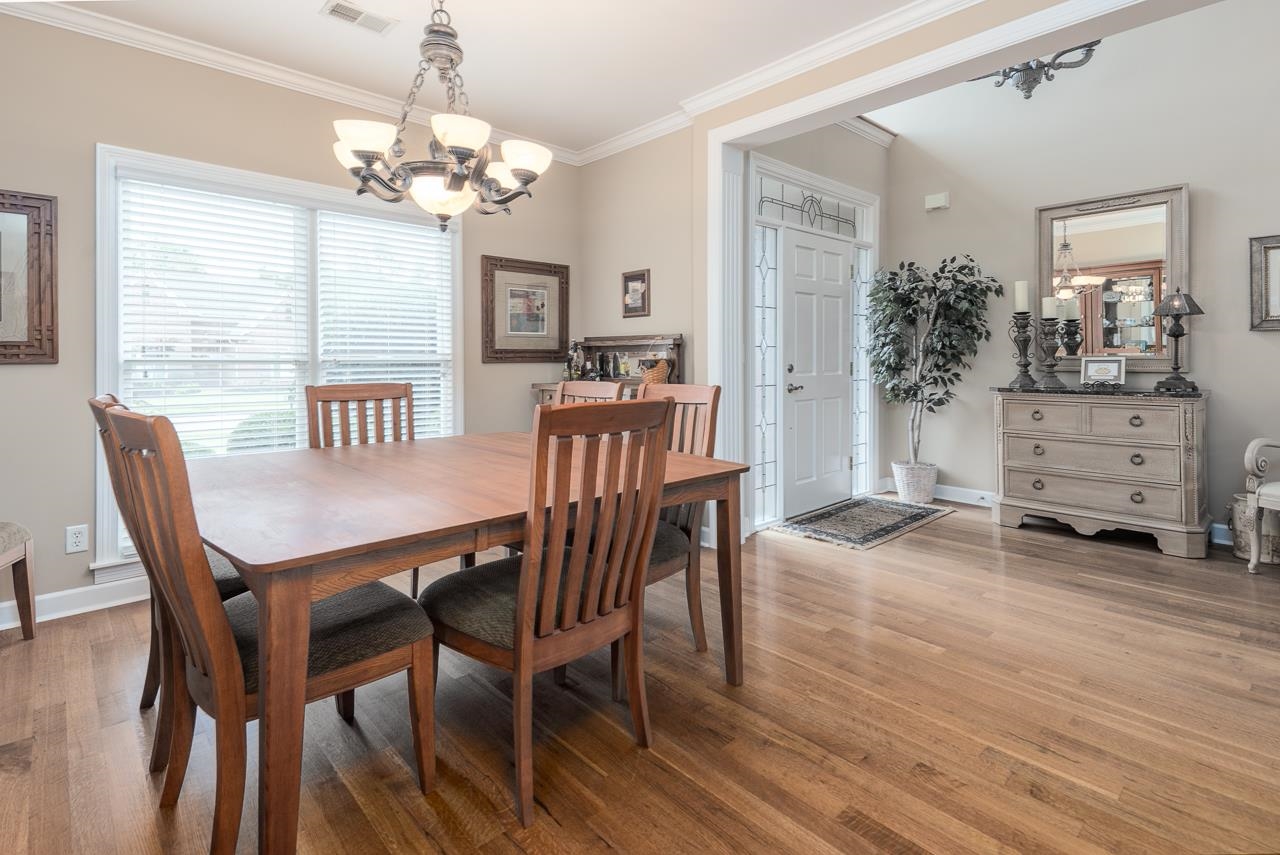 Large dining room with double windows. Opens to the Foyer and Great Room.