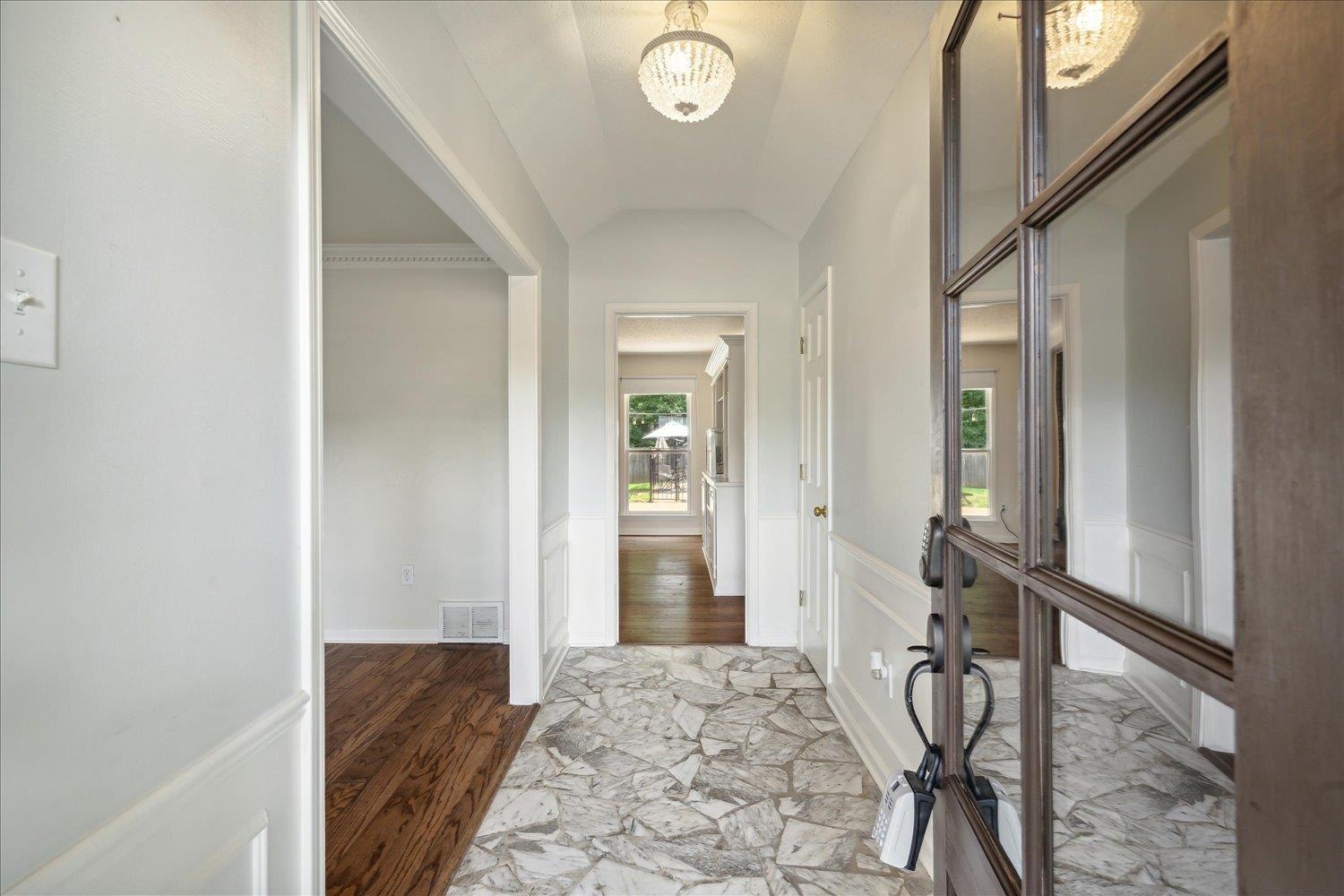 Marble Entry with new chandelier