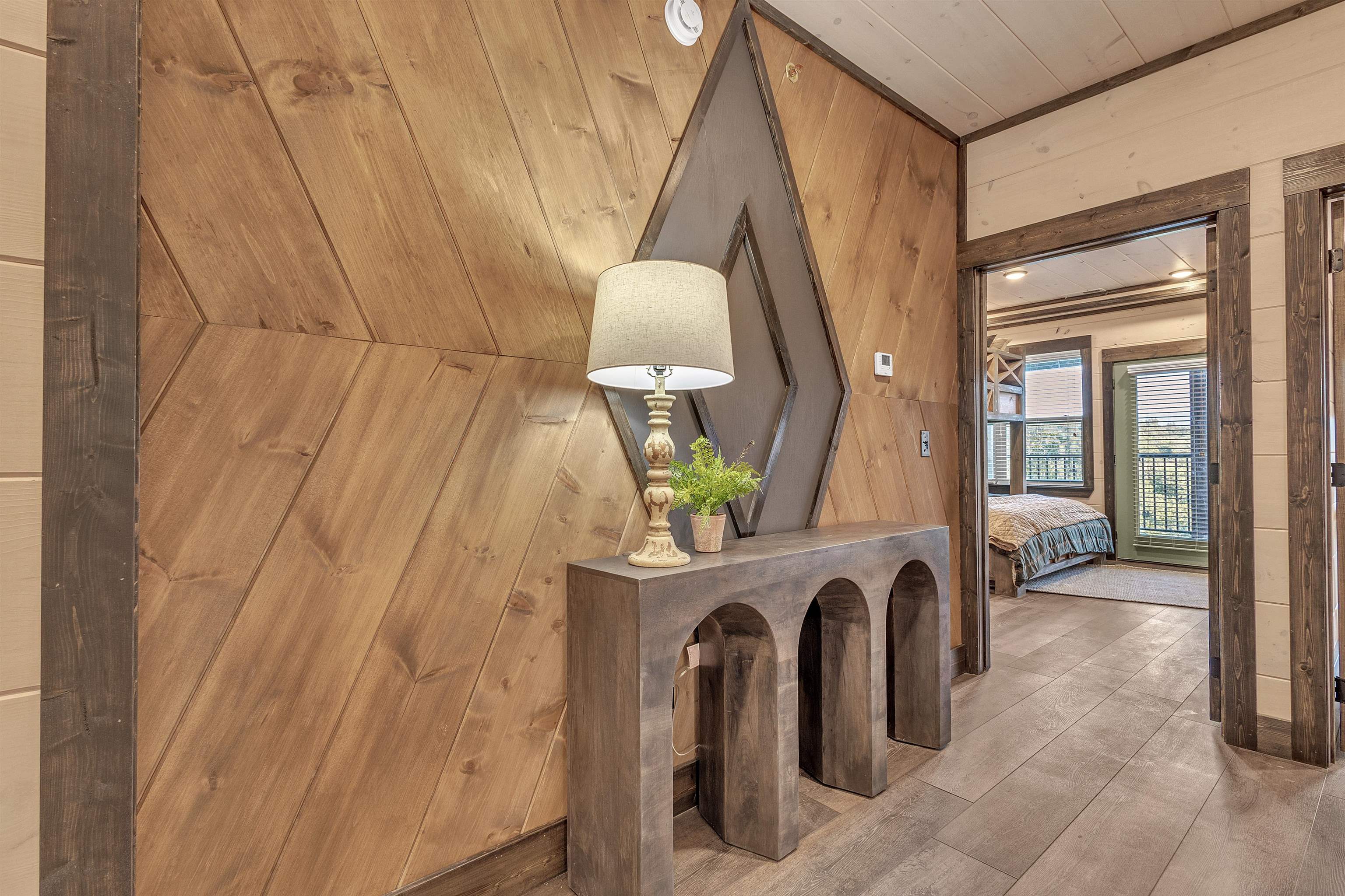 Interior space featuring wood ceiling, hardwood / wood-style floors, and wood walls