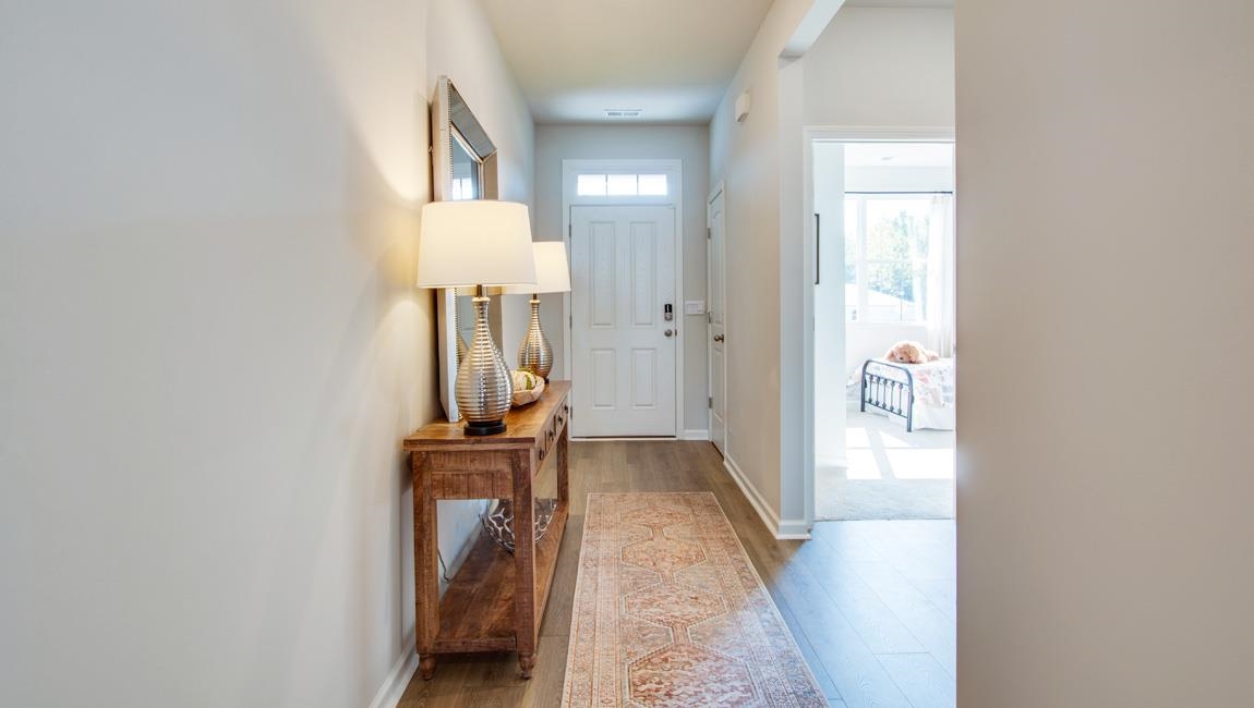 Doorway to outside with hardwood / wood-style flooring